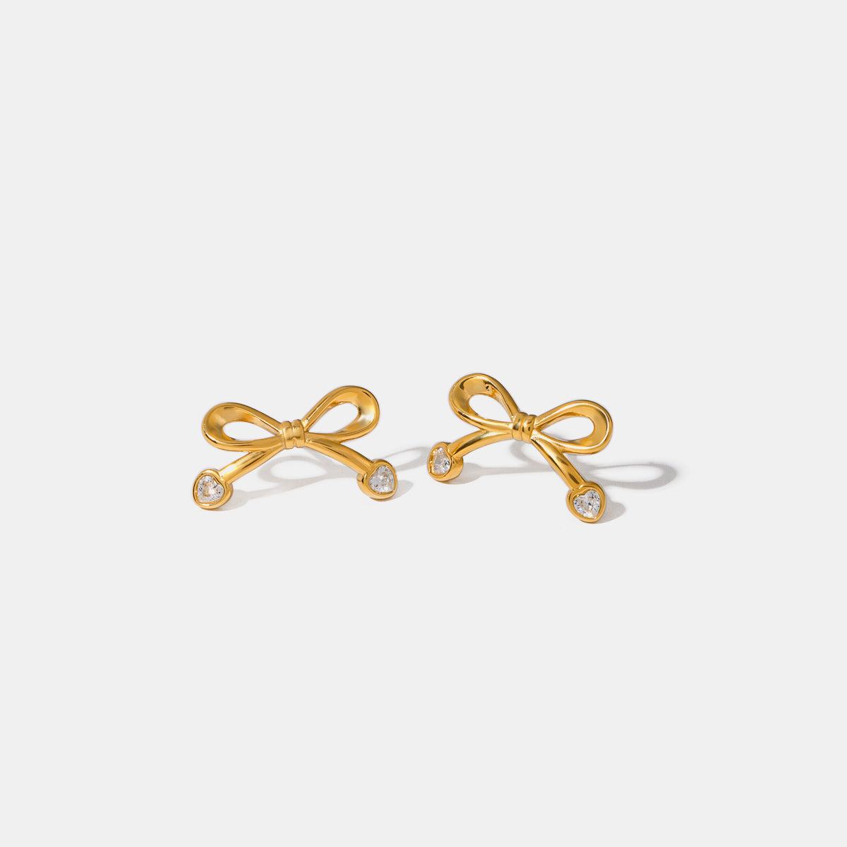 Stainless Steel Inlaid Zircon Bow Earrings - Charming Charlie