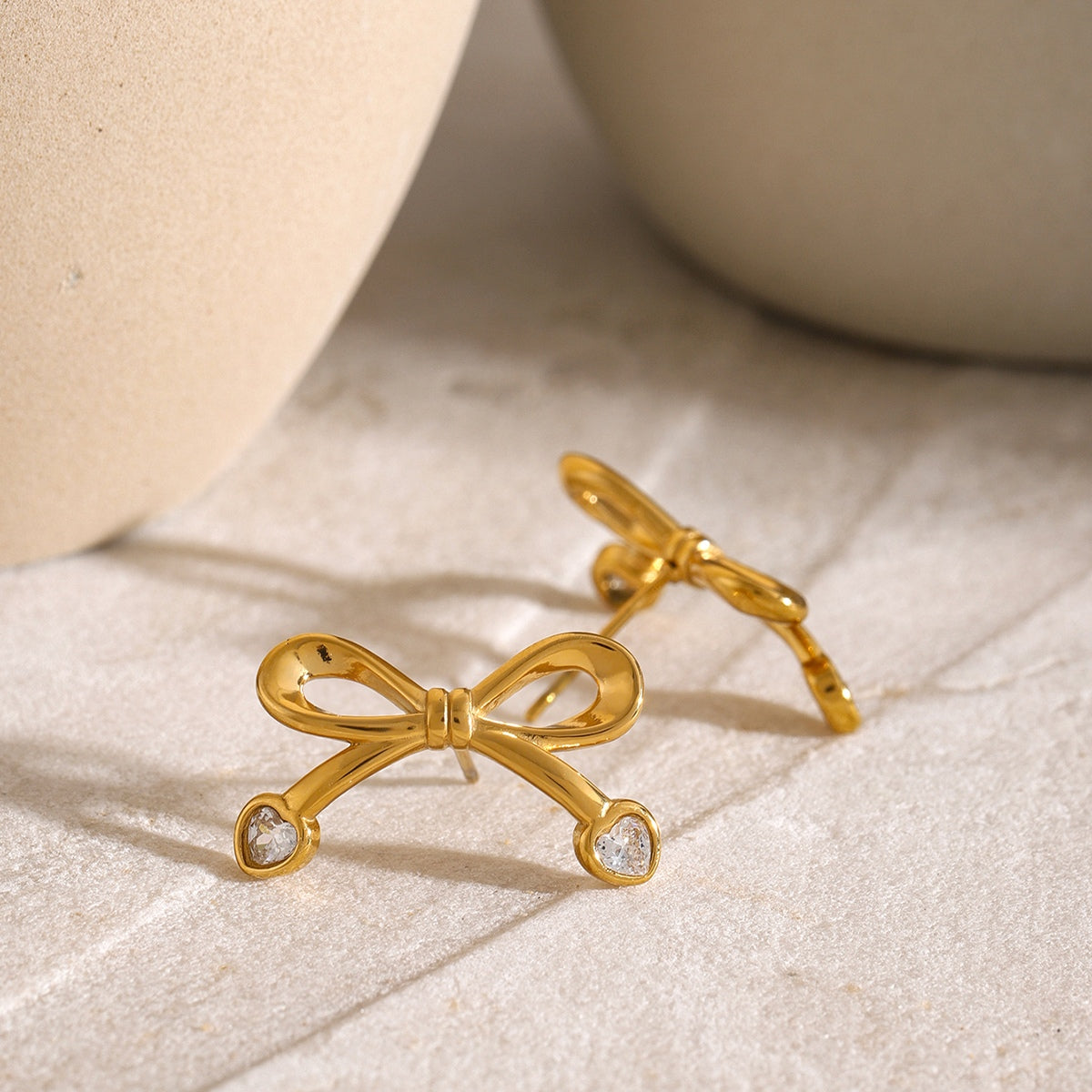 Stainless Steel Inlaid Zircon Bow Earrings - Charming Charlie