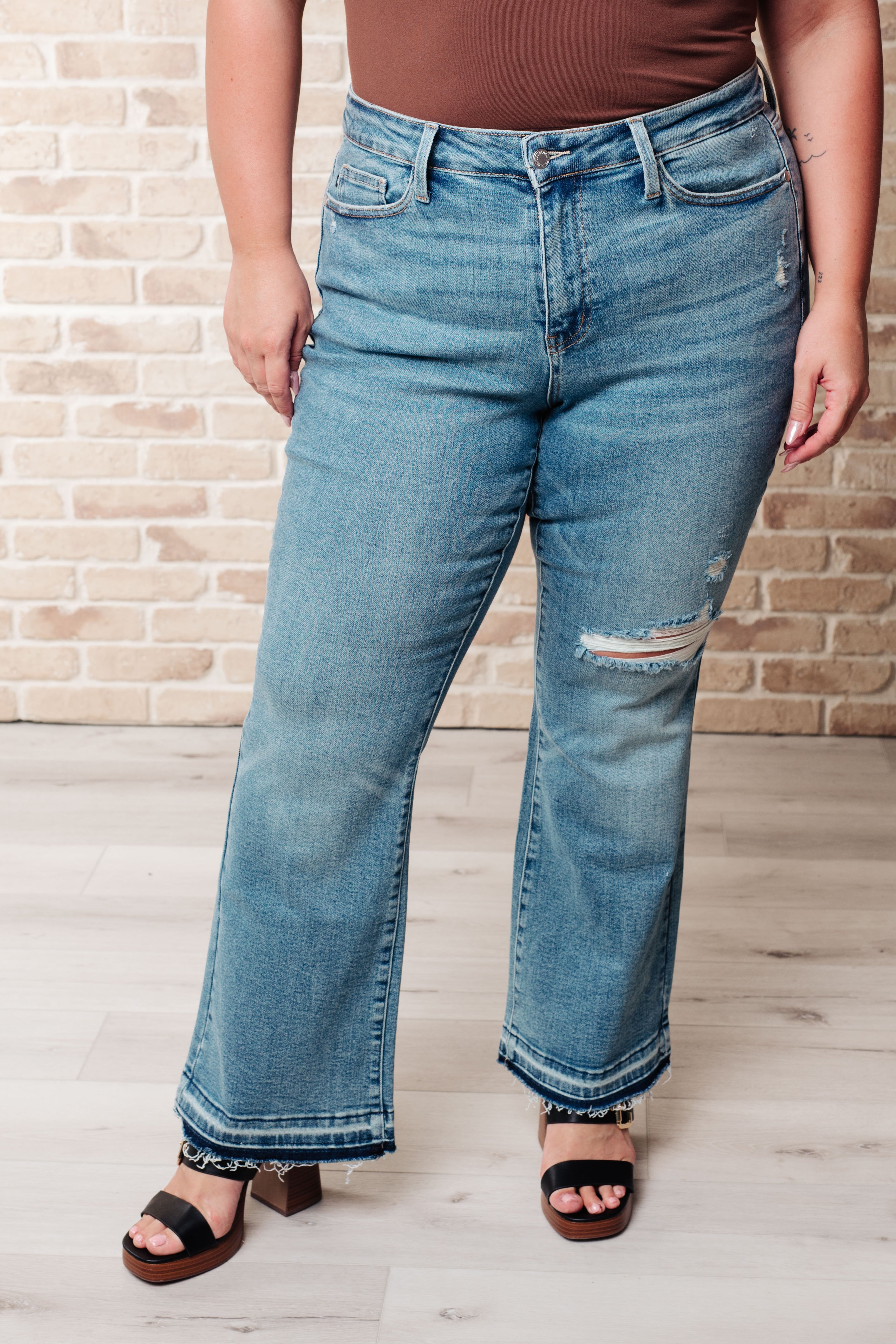 Isla Mid Rise Distressed Released Hem Bootcut Jeans - Charming Charlie