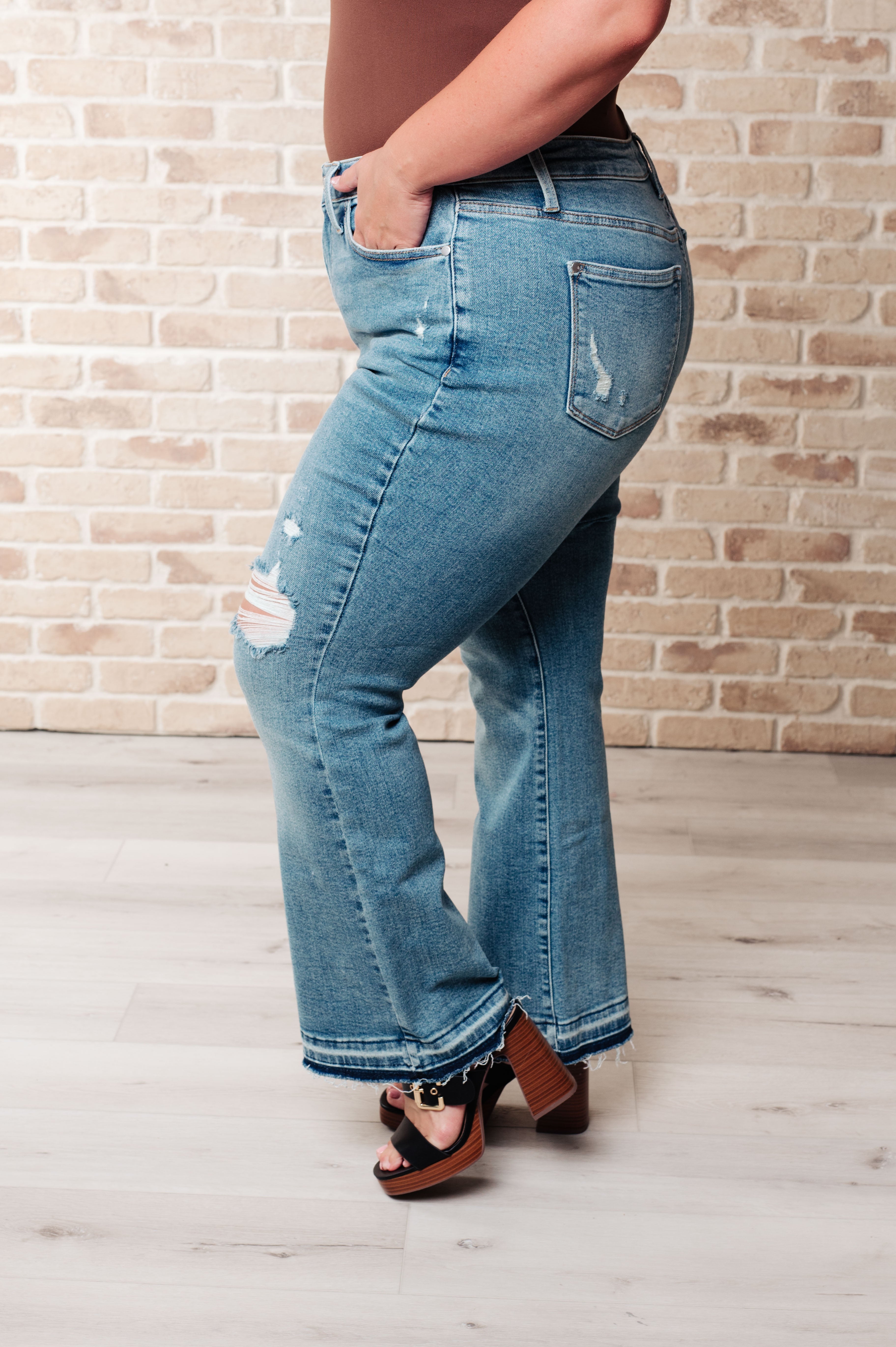 Isla Mid Rise Distressed Released Hem Bootcut Jeans - Charming Charlie