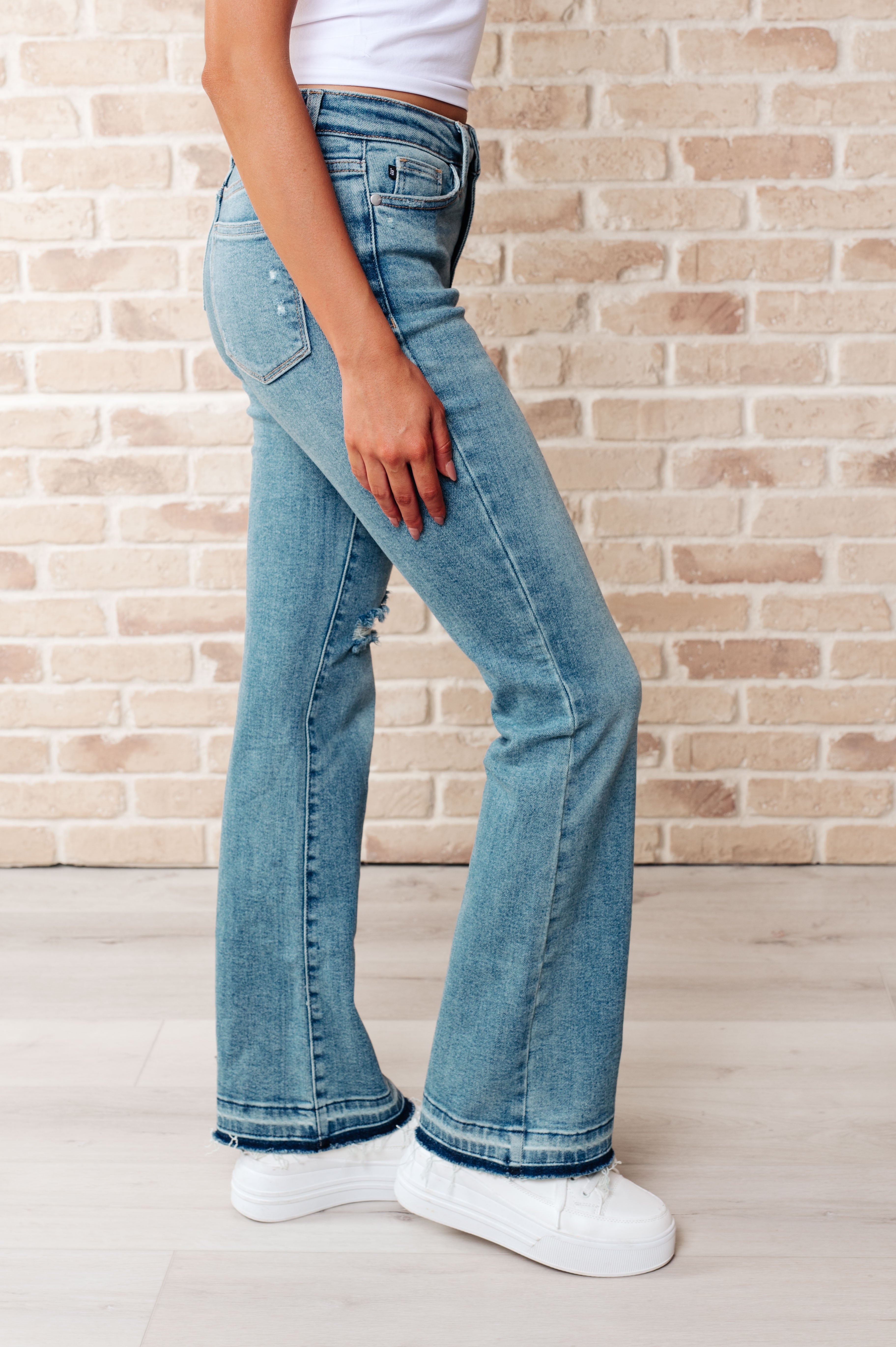 Isla Mid Rise Distressed Released Hem Bootcut Jeans - Charming Charlie