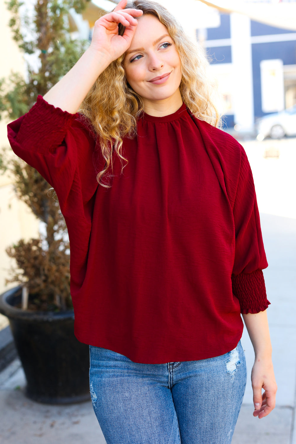 Bold Dreams Wine Smocked Three Quarter Sleeve Tie Back Top - Charming Charlie