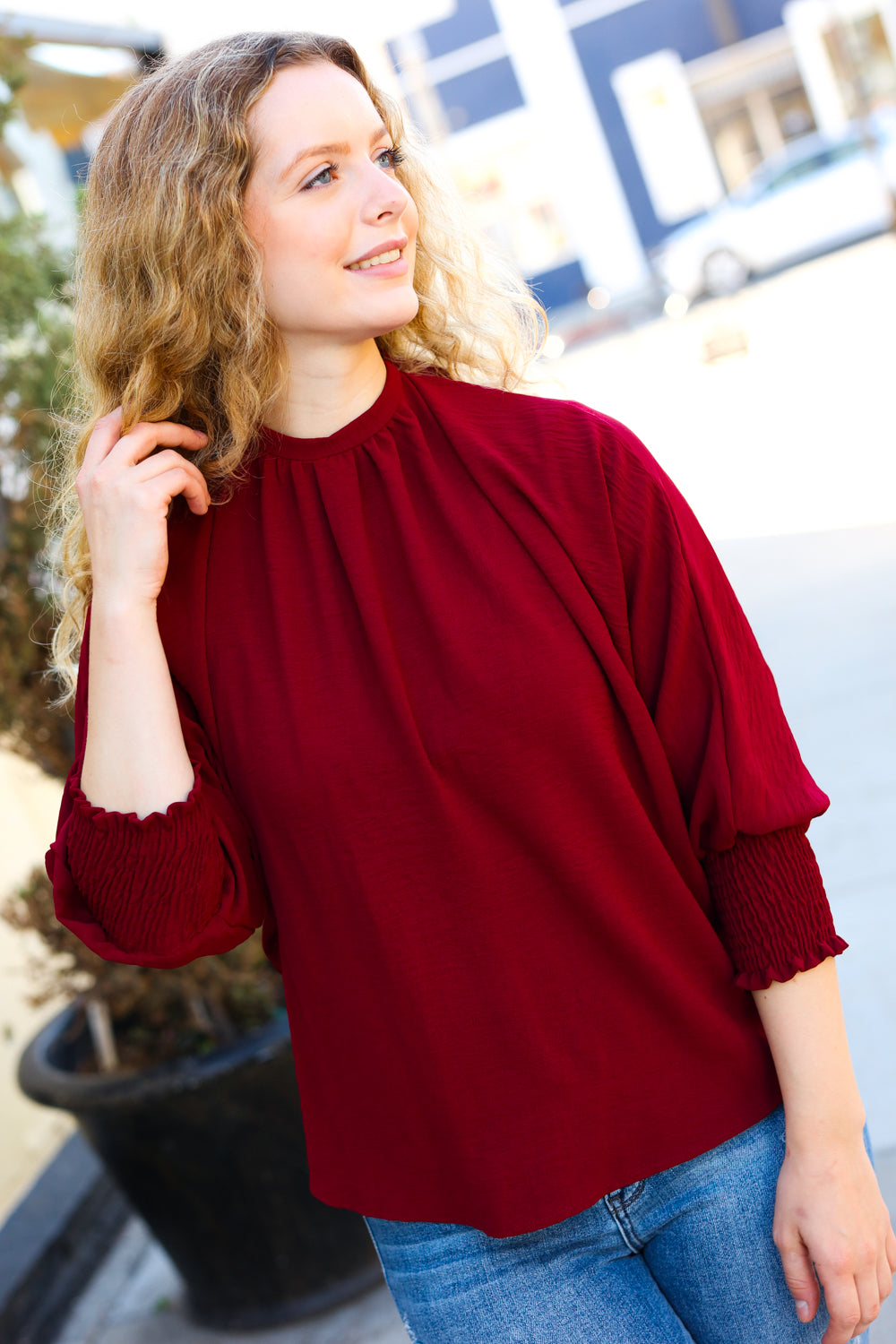 Bold Dreams Wine Smocked Three Quarter Sleeve Tie Back Top - Charming Charlie