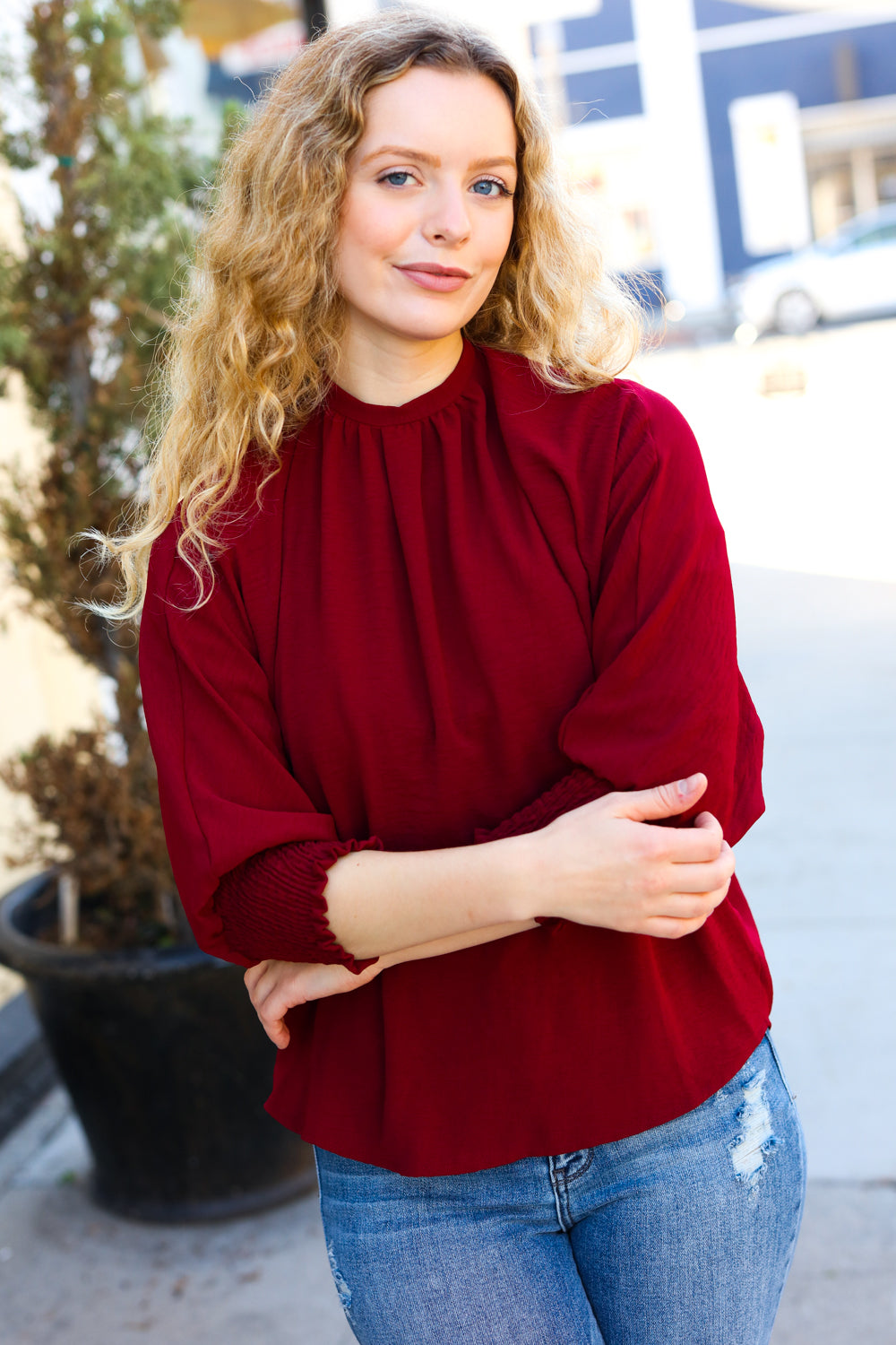 Bold Dreams Wine Smocked Three Quarter Sleeve Tie Back Top - Charming Charlie