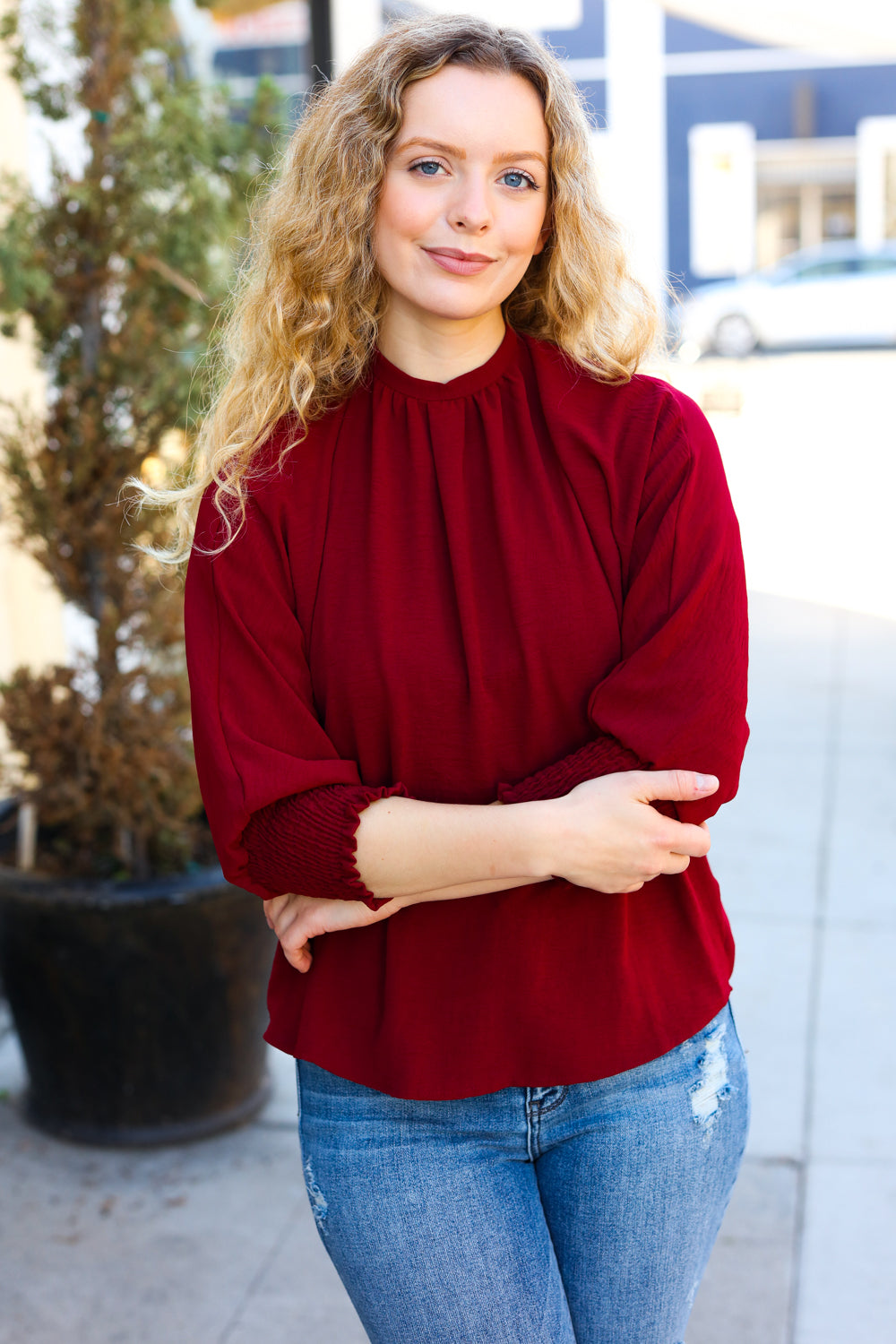 Bold Dreams Wine Smocked Three Quarter Sleeve Tie Back Top - Charming Charlie