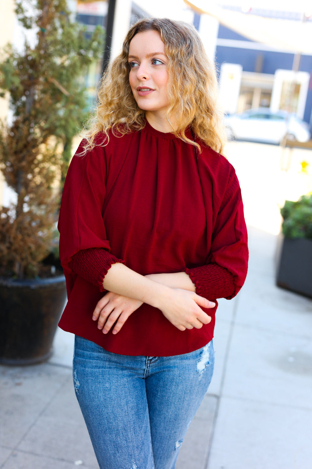 Bold Dreams Wine Smocked Three Quarter Sleeve Tie Back Top - Charming Charlie