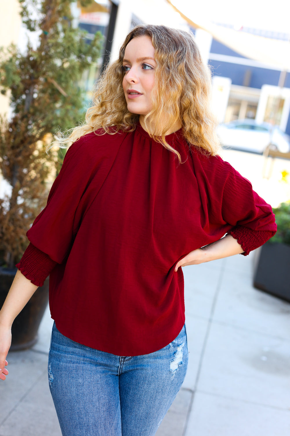 Bold Dreams Wine Smocked Three Quarter Sleeve Tie Back Top - Charming Charlie