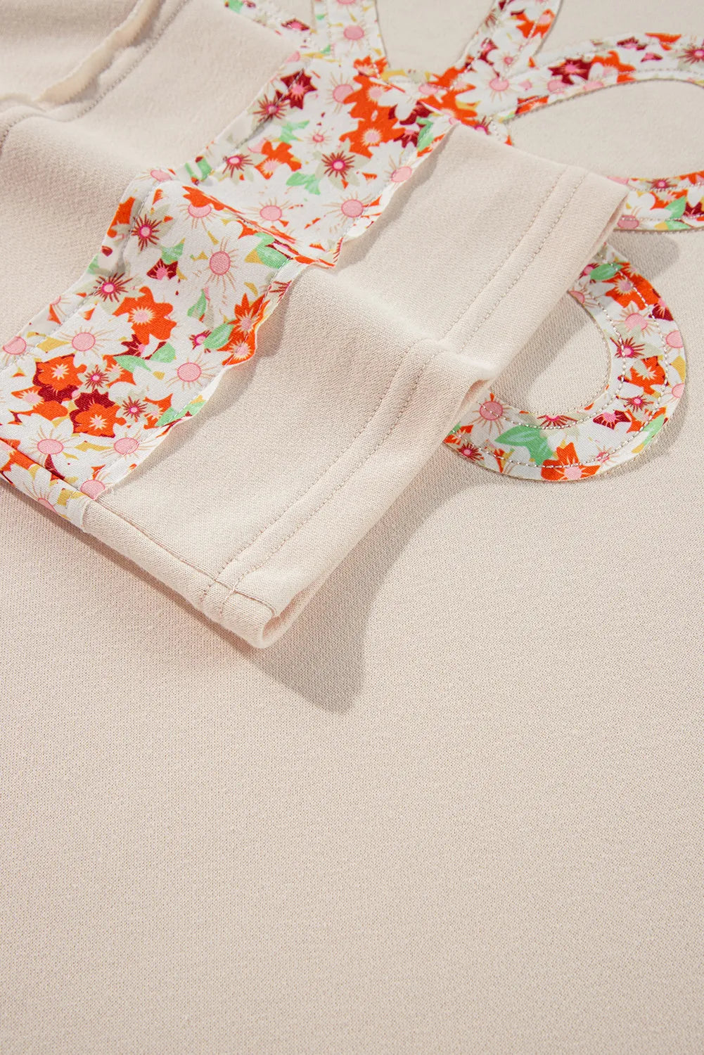 Exposed Seam Slit Floral Round Neck Blouse - Charming Charlie