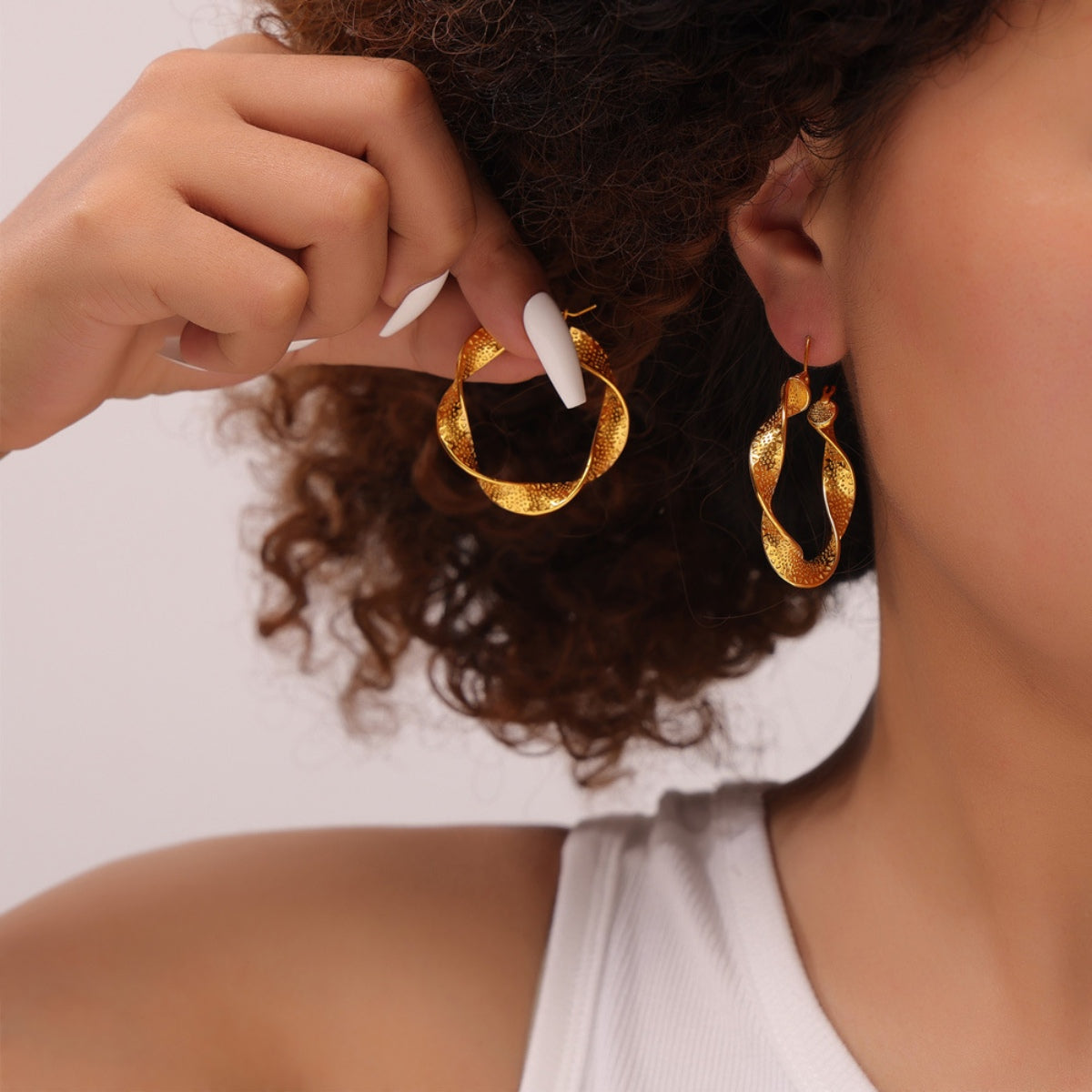 Titanium Steel Twisted Earrings - Charming Charlie