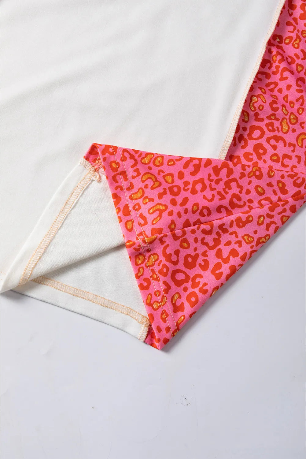 Exposed Seam Leopard Color Block Round Neck Top - Charming Charlie