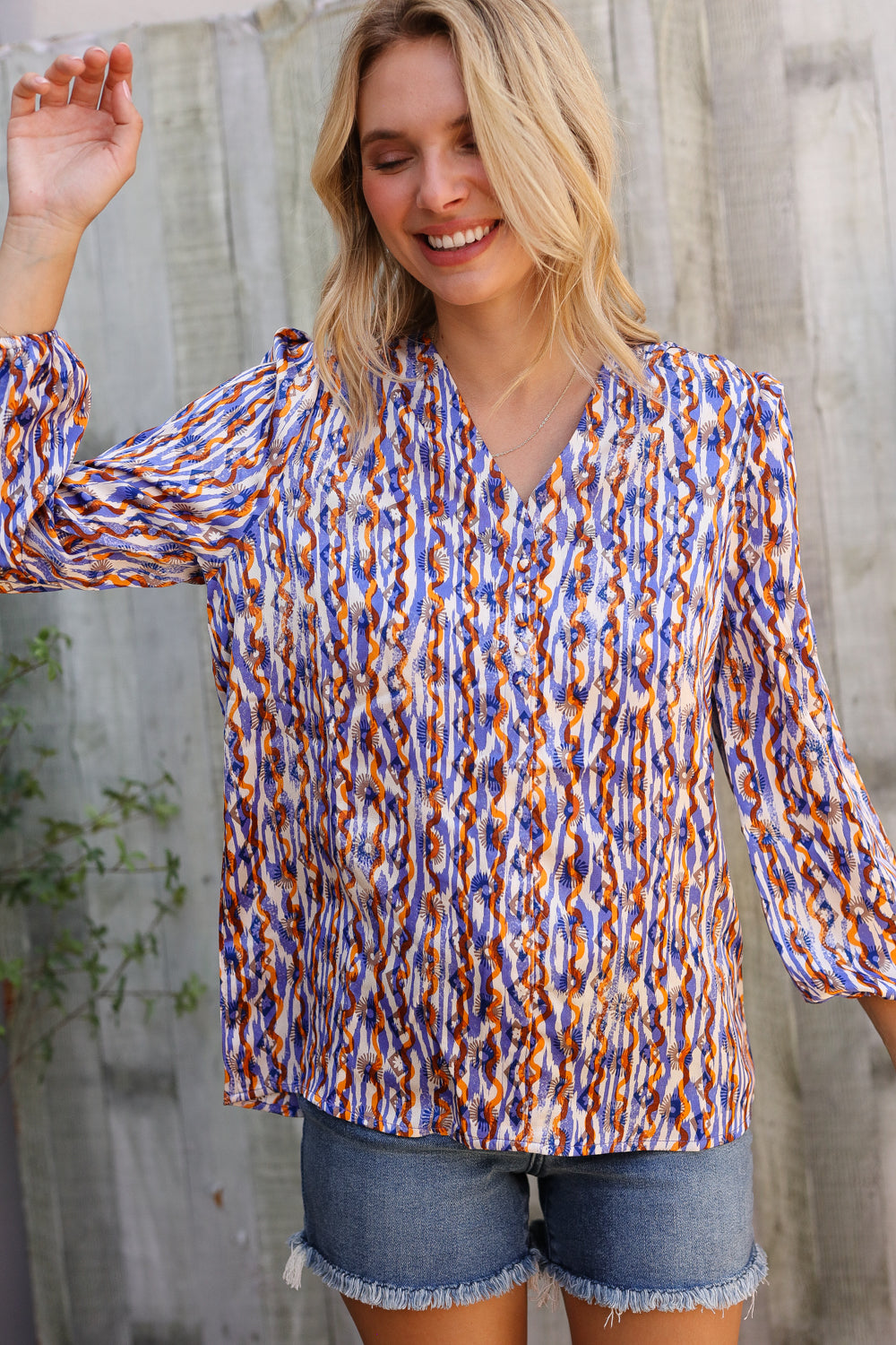 On A Wild Streak V Neck Fabric Button Detail Blouse - Charming Charlie