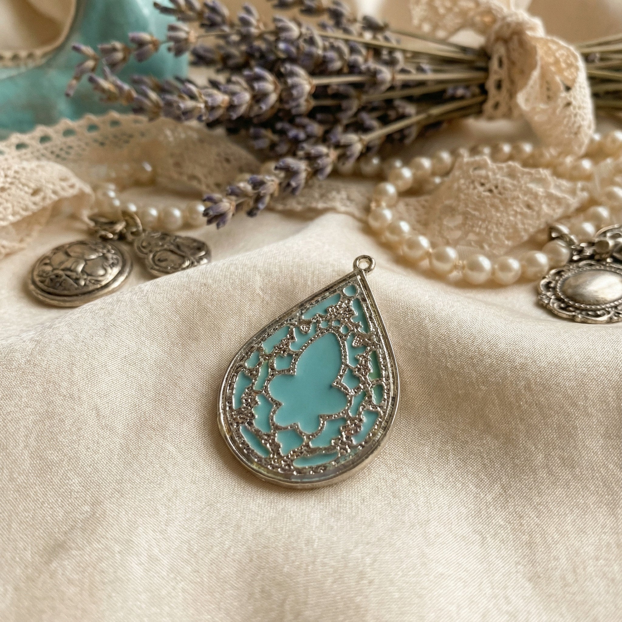Elegant Vintage-Style Teardrop Filigree Pendant - Charming Charlie