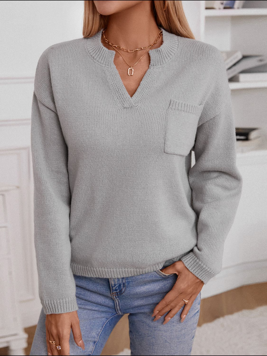 Pocketed Notched Long Sleeve Knit Top - Charming Charlie
