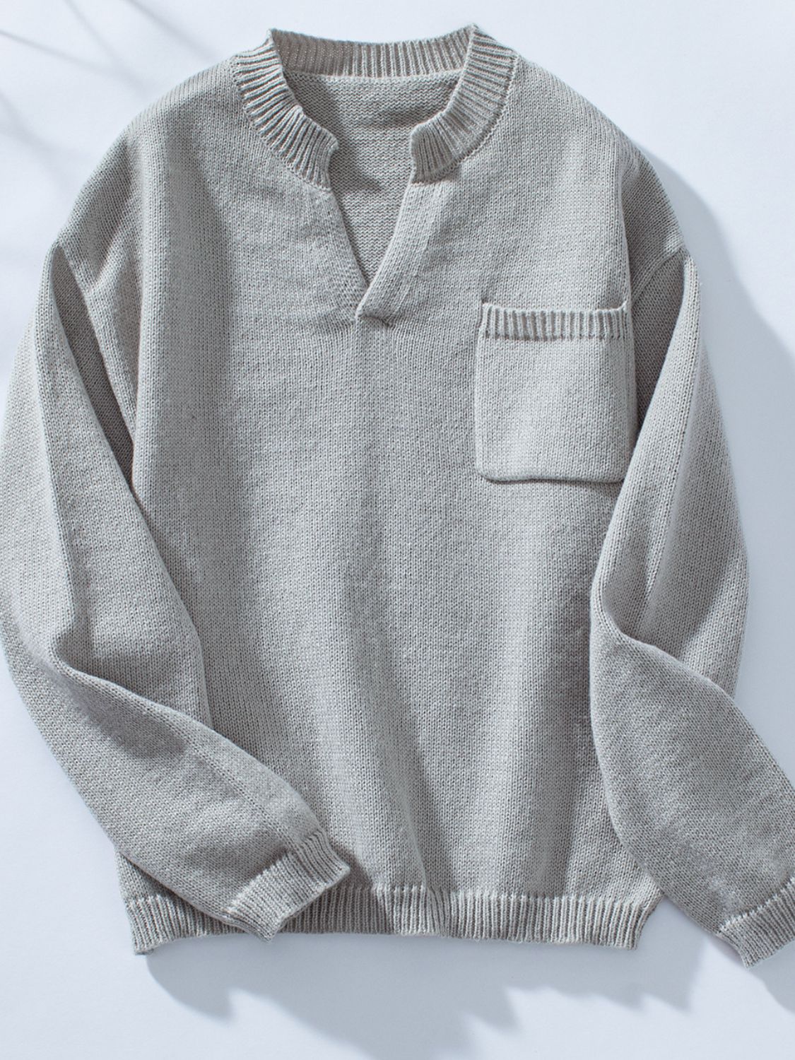 Pocketed Notched Long Sleeve Knit Top - Charming Charlie