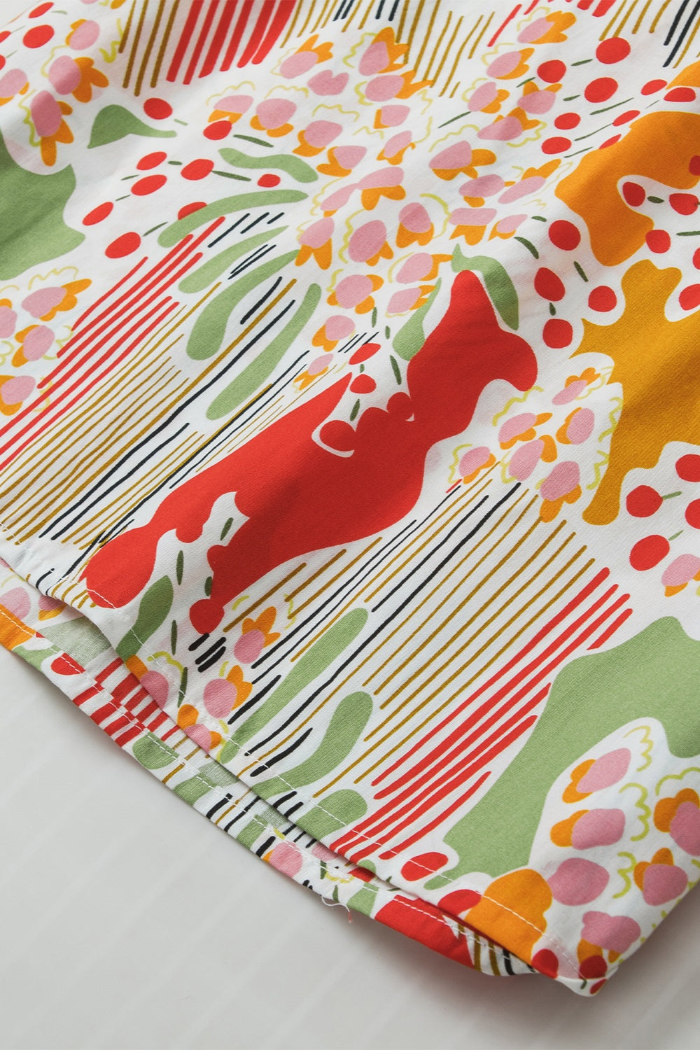 Printed Notched Short Sleeve Blouse - Charming Charlie