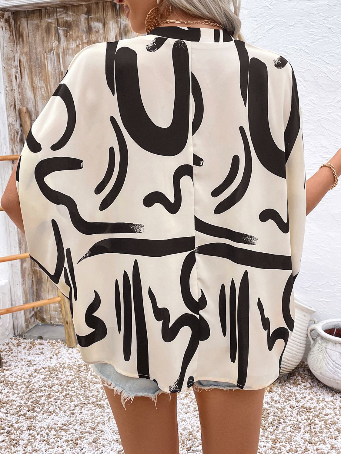 Perfee Printed Notched Half Sleeve Blouse - Charming Charlie