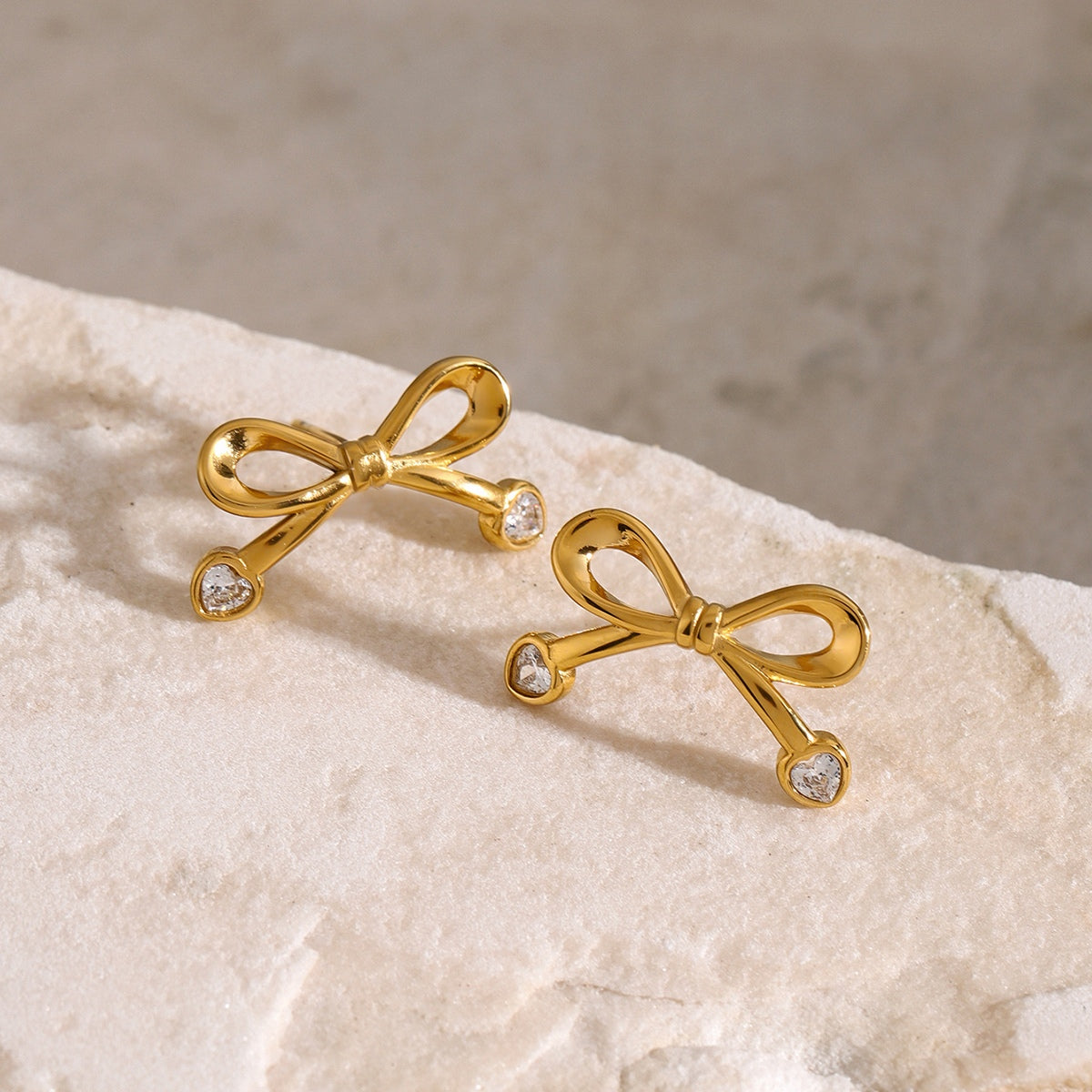 Stainless Steel Inlaid Zircon Bow Earrings - Charming Charlie