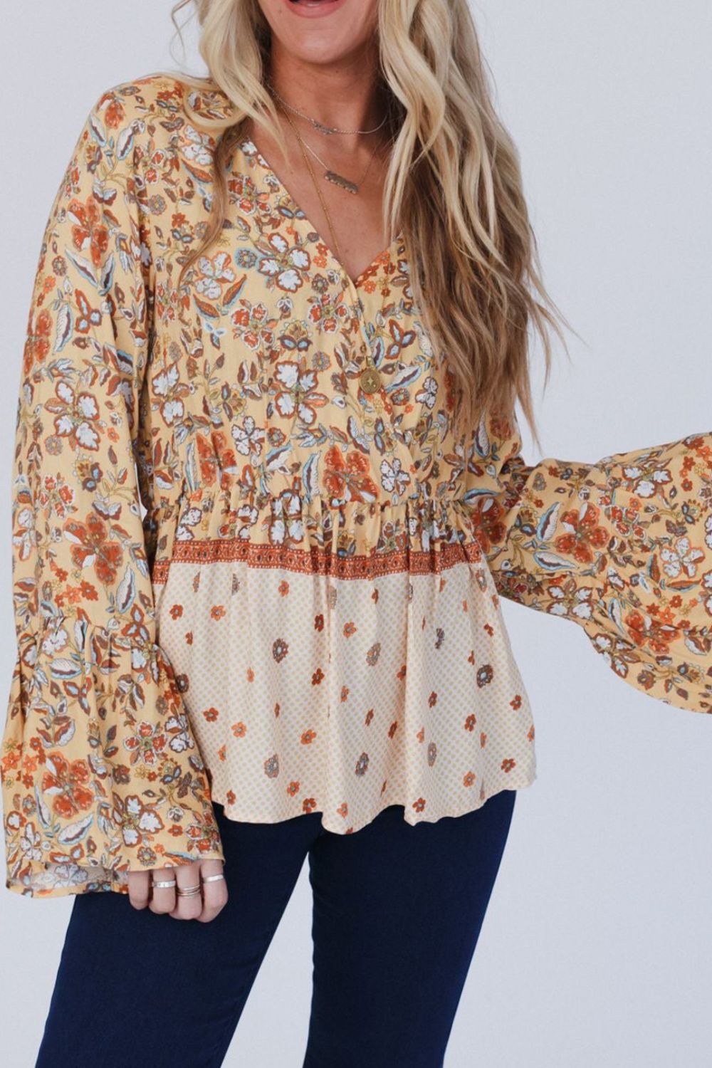 Peplum Printed Surplice Flare Sleeve Blouse - Charming Charlie
