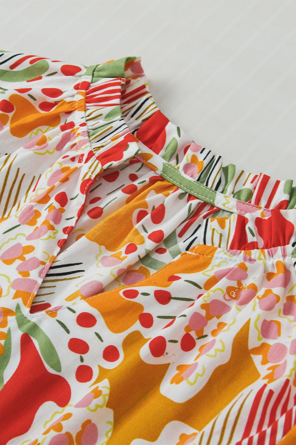 Printed Notched Short Sleeve Blouse - Charming Charlie