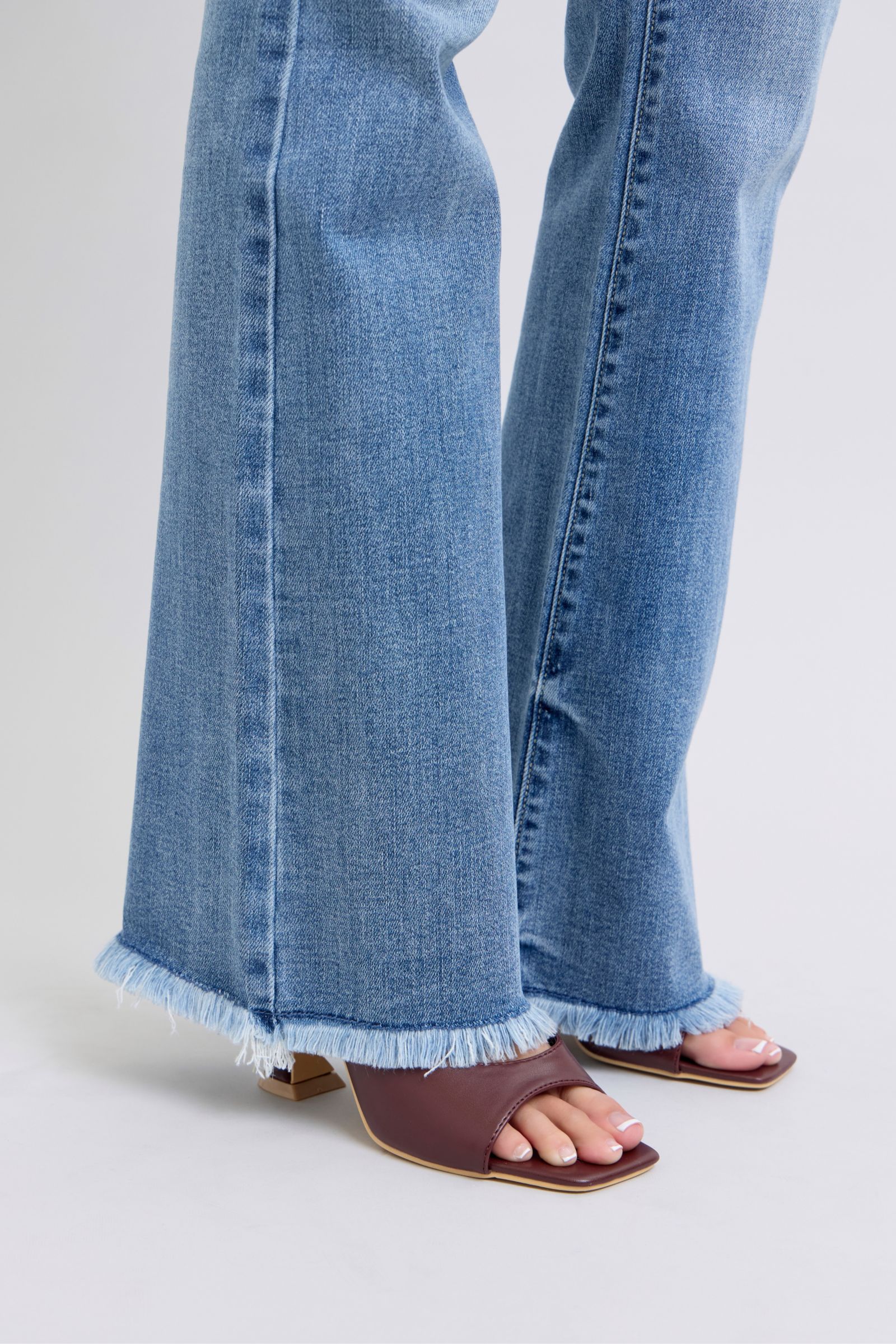 Judy Blue Full Size Raw Hem High Rise Bootcut Jeans - Charming Charlie