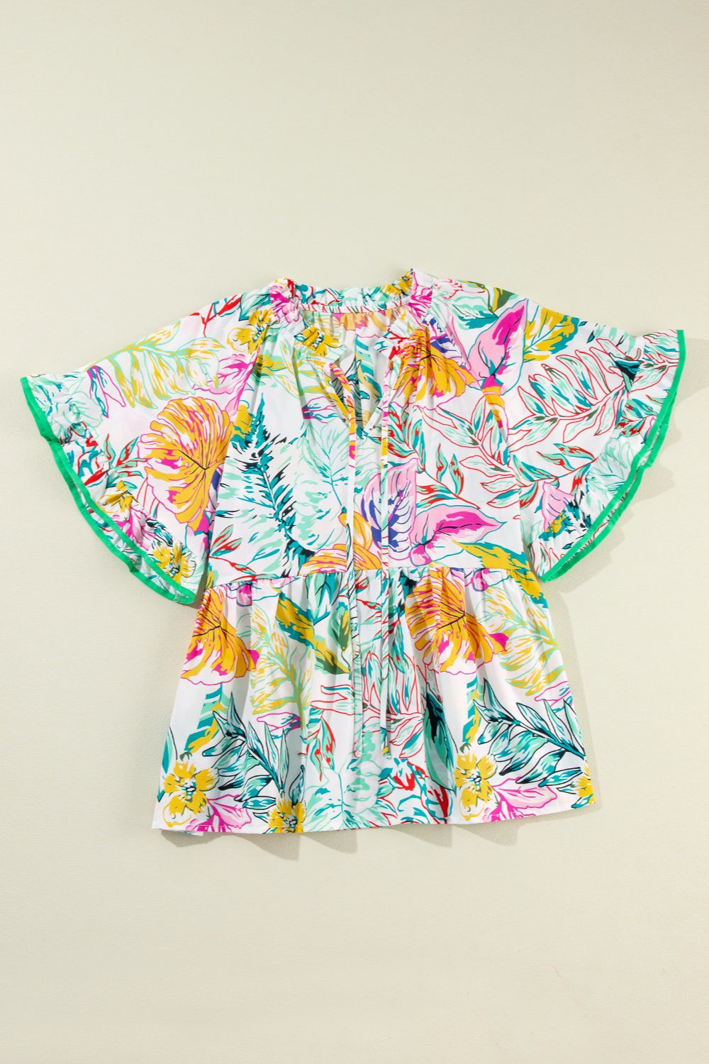Ruffled Printed Tie Neck Blouse - Charming Charlie