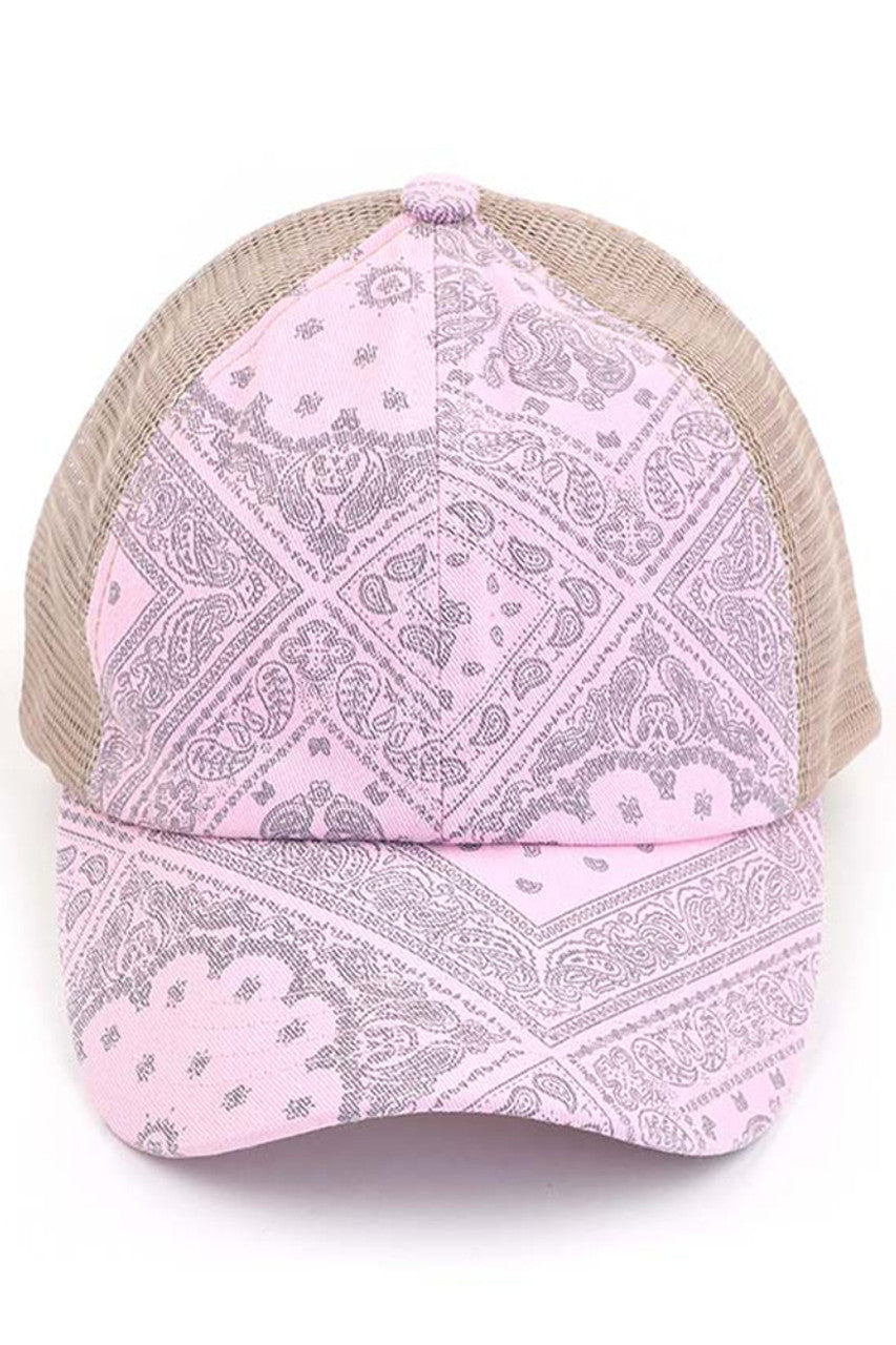 Baby Pink C.C PAISLEY BANDANA CRISS CROSS PONYCAP is a stylish addition to any wardrobe. Its paisley bandana design adds a touch of retro flair, while the criss cross ponycap style keeps your hair out of your face. Made with high-quality materials, this cap not only looks great, but also provides comfort and durability. Elevate your fashion game with this must-have accessory.
