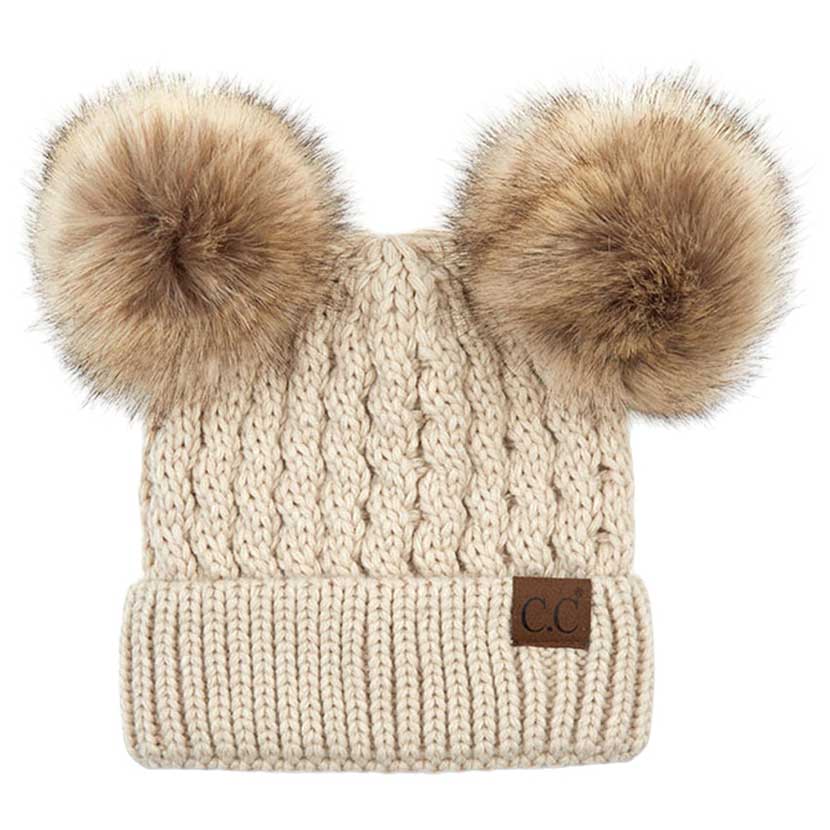 Beige C.C Double Pom Pom All Over Cable Knit Beanie Hat., Stay warm and cozy this winter. Expertly crafted from a premium cable knit fabric, this stylish beanie provides maximum insulation and breathability. Two pom poms on top add a touch of flair to your look. Perfect for chilly winter days, this is an ideal winter gift.