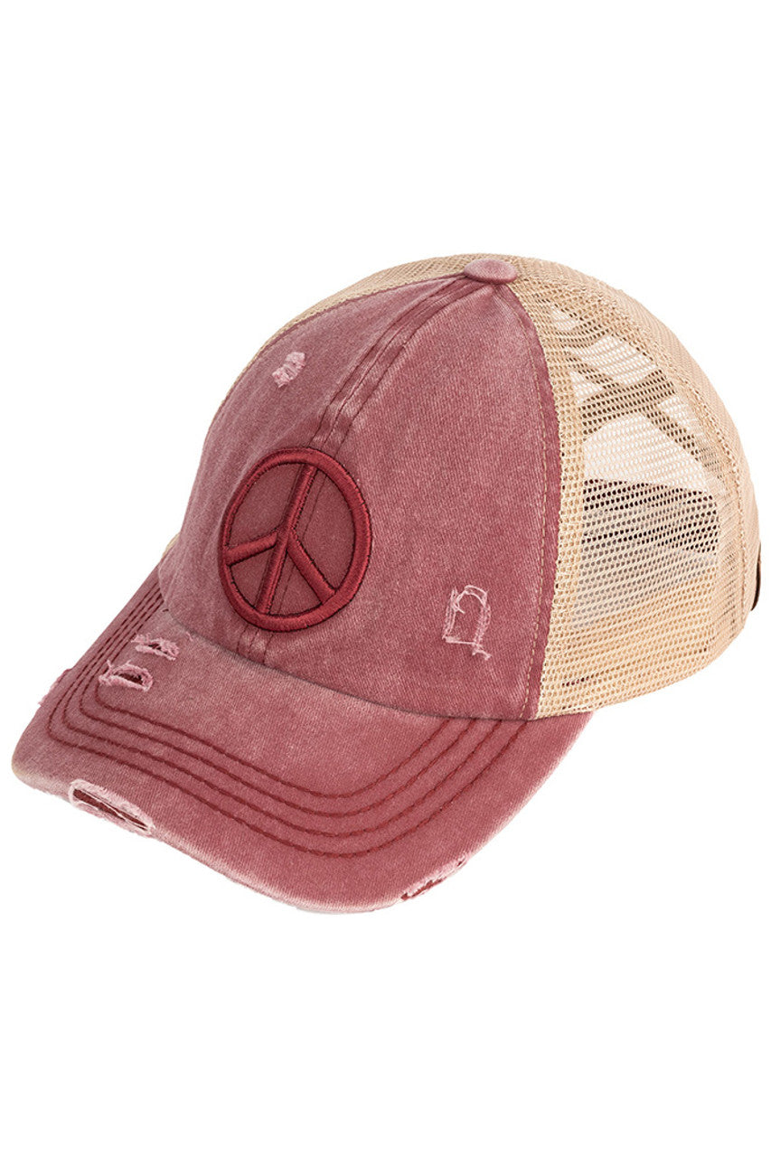 Berry C.C PEACE SIGN DISTRESSED PONY CAP - the perfect addition to your wardrobe for a trendy look. Made from high-quality materials, this cap features a peace sign design and distressed details that add character and edge to any outfit. Stay stylish and spread good vibes with this cap.