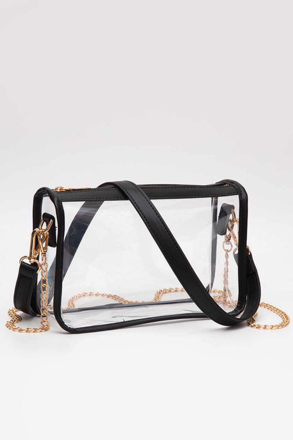 Black Clear Rectangle Stadium Concert Crossbody Bag offers a sleek, transparent design ideal for event security compliance. Its rectangular shape provides ample space for essentials while maintaining a compact profile. The adjustable crossbody strap ensures comfortable wear, making it perfect for concerts and stadium visits where quick access and visibility are essential. Durable materials guarantee longevity, combining practicality with modern style for hassle-free outings.
