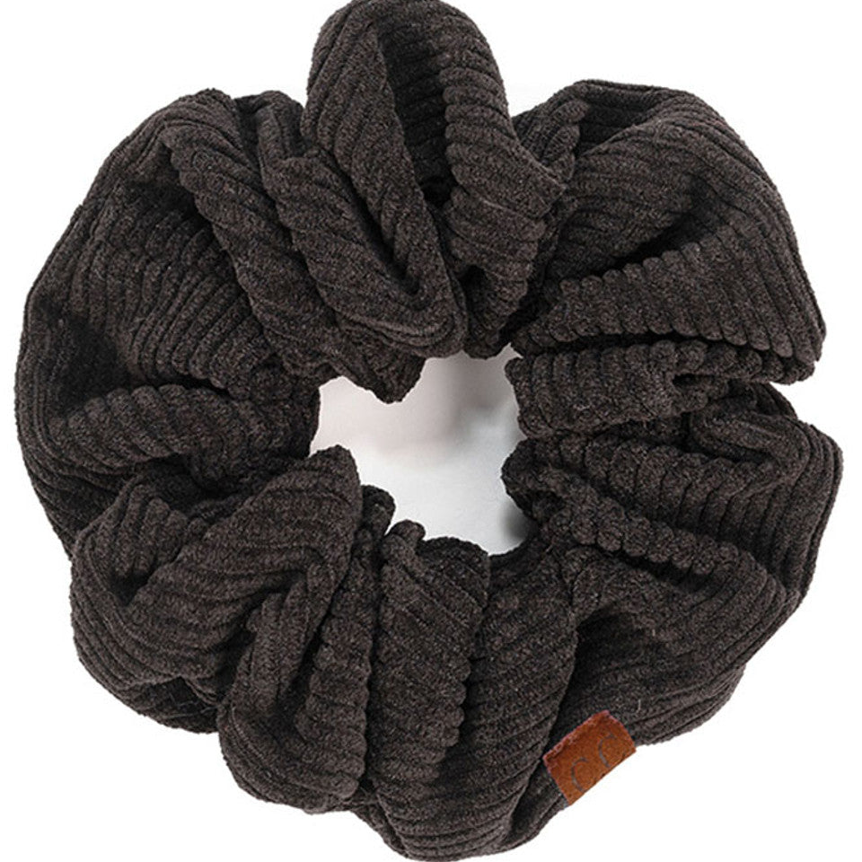 Black C.C Corduroy Solid Color Soft Scrunchies are a must-have for any hair accessory collection. Made from soft and durable corduroy material, these scrunchies are perfect for any hair type and can hold hair in place comfortably without causing any damage. Add some style to your hairstyle with these versatile and fashionable scrunchies.