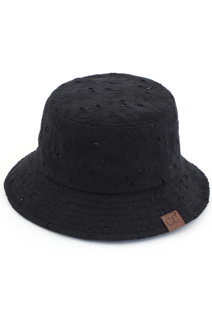 Black C.C EMBROIDERED FLORAL COTTON EYELET HAT is made of high-quality cotton and features beautiful embroidered floral details. Perfect for adding a touch of elegance and style to any outfit. The lightweight and breathable fabric provide comfort and protection from the sun.