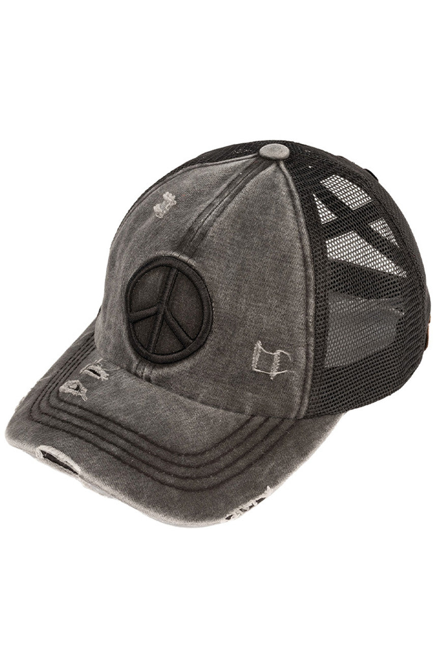 Black C.C PEACE SIGN DISTRESSED PONY CAP - the perfect addition to your wardrobe for a trendy look. Made from high-quality materials, this cap features a peace sign design and distressed details that add character and edge to any outfit. Stay stylish and spread good vibes with this cap.