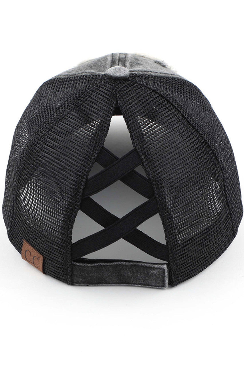 Black C.C SMILE CRISS-CROSS PONY CAP is a versatile and stylish accessory. Made with high-quality materials and a unique criss-cross design, it offers a secure and comfortable fit. Perfect for any season, this cap adds a touch of fashion to any outfit.