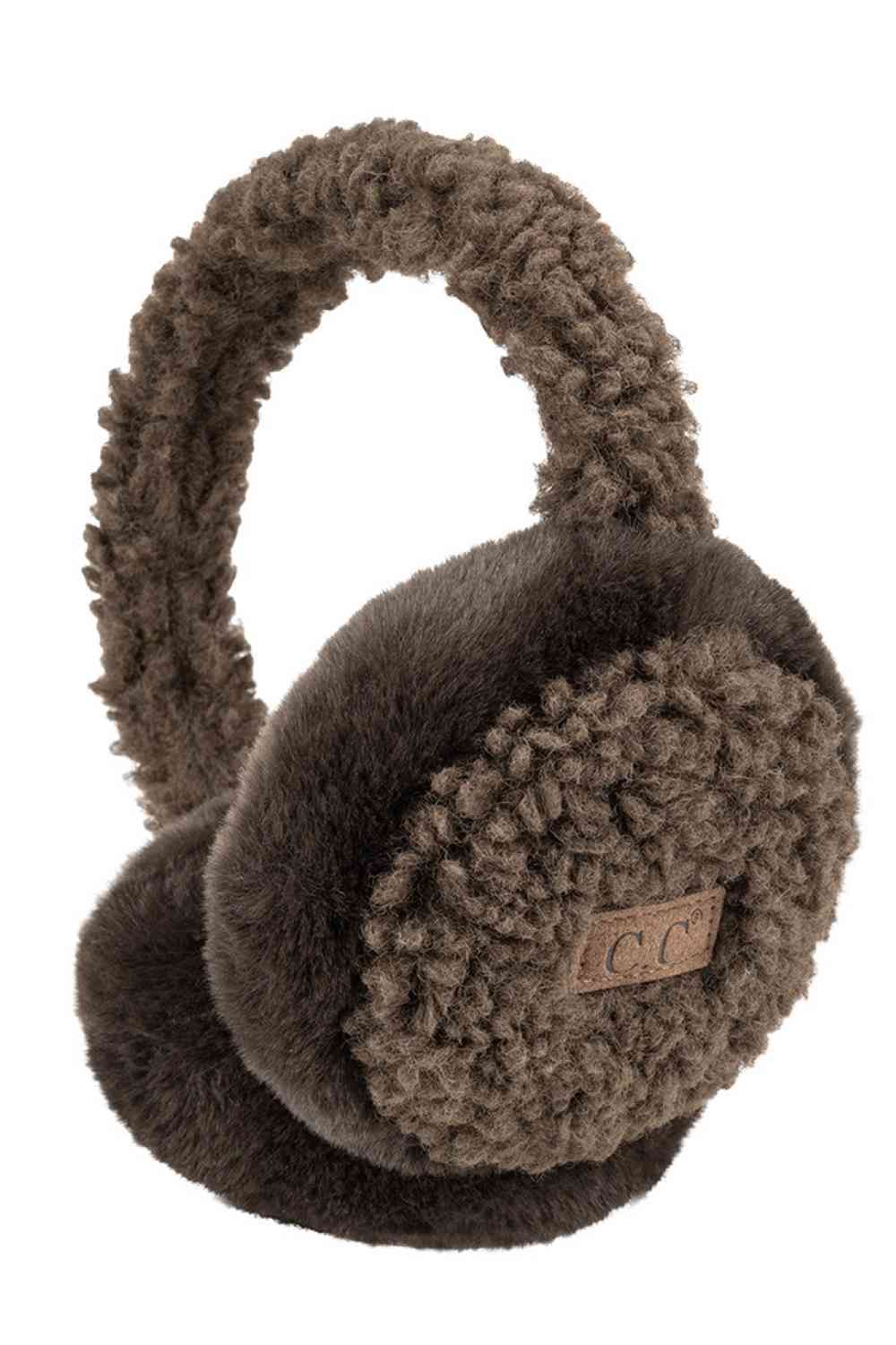 Brown C.C Faux Fur Sherpa Earmuffs. Stay warm and stylish with these. Crafted with quality faux fur and Sherpa on the inside for ultimate comfort, these earmuffs provide superior insulation and protection from the cold. Their classic and timeless design allows them to easily match with any outfit. 