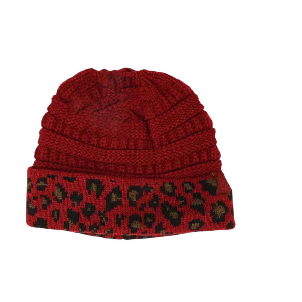 Burgundy Matching Cuff Leopard Print CC Beanie Tail combines bold leopard patterning with a cozy cuff for an effortlessly stylish accessory. Designed with an extended tail shape, this beanie provides a comfortable fit while adding a fashionable edge to your cold-weather wardrobe. Its soft, durable fabric ensures warmth and long-lasting wear, making it a practical choice for everyday use with a distinctive flair.