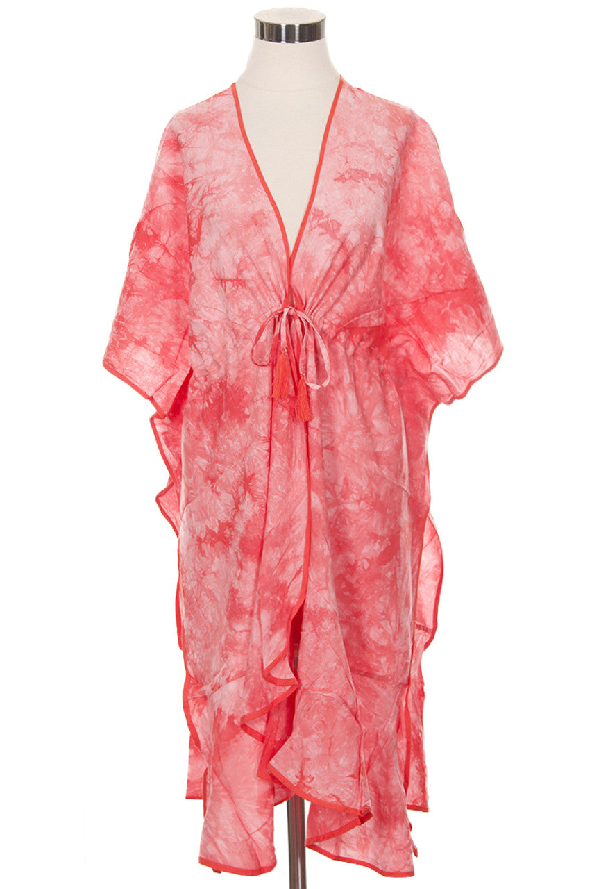 Coral C.C. Tie Dye Beach Coverup is perfect for your next beach day. Made with high-quality material, it offers both comfort and style. The vibrant tie-dye design adds a fun touch to your beach outfit, while the lightweight fabric allows for easy movement. Stay cool and fashionable with this must-have beach coverup.