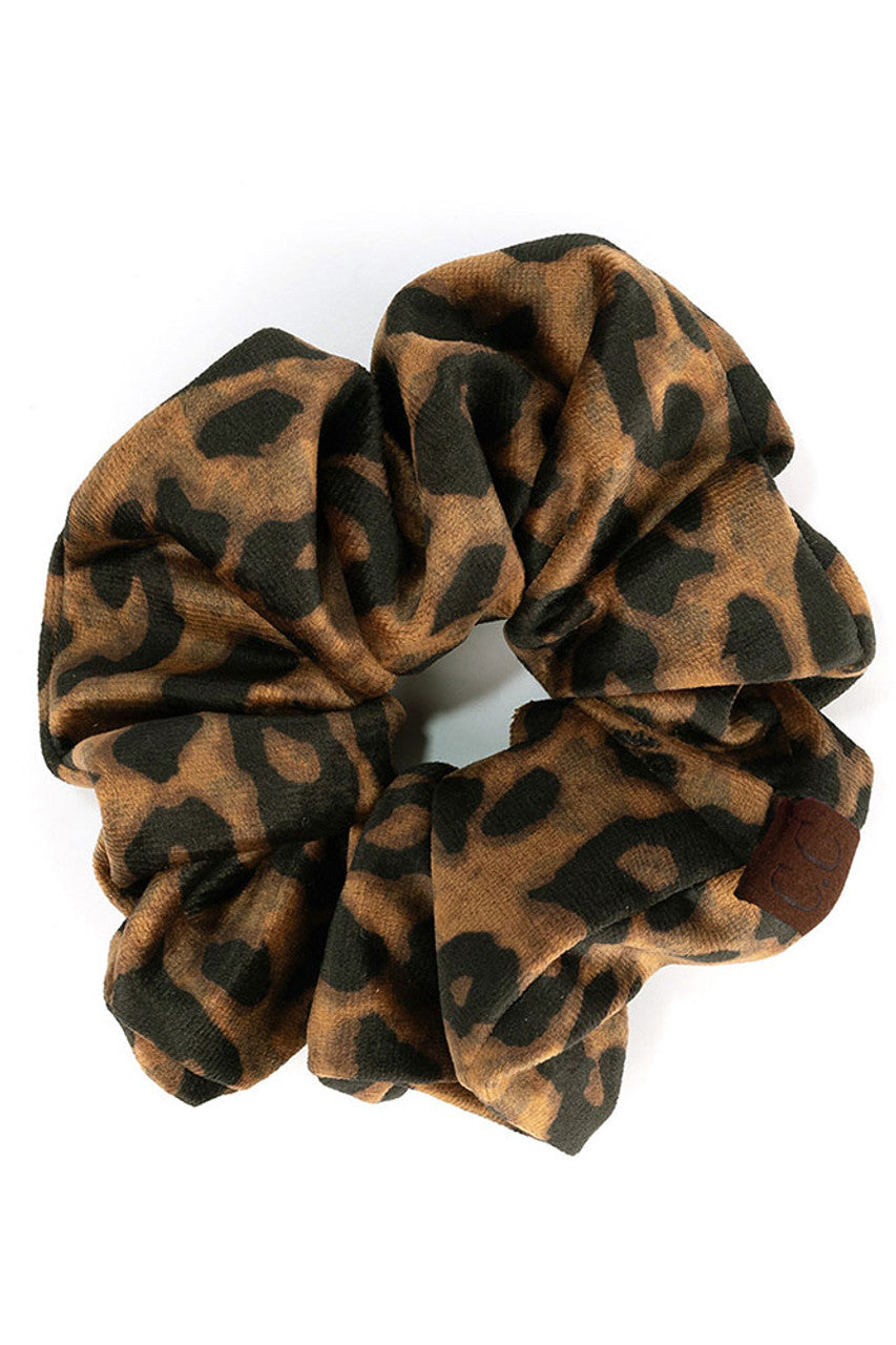 Camel C.C Leopard Velvet Scrunchies are the perfect addition to your hair accessory collection. Made with luxurious velvet material, these scrunchies provide a soft and comfortable hold for all hair types. With their trendy leopard print design, they add a touch of style to any outfit. Upgrade your hair game with these must-have scrunchies!