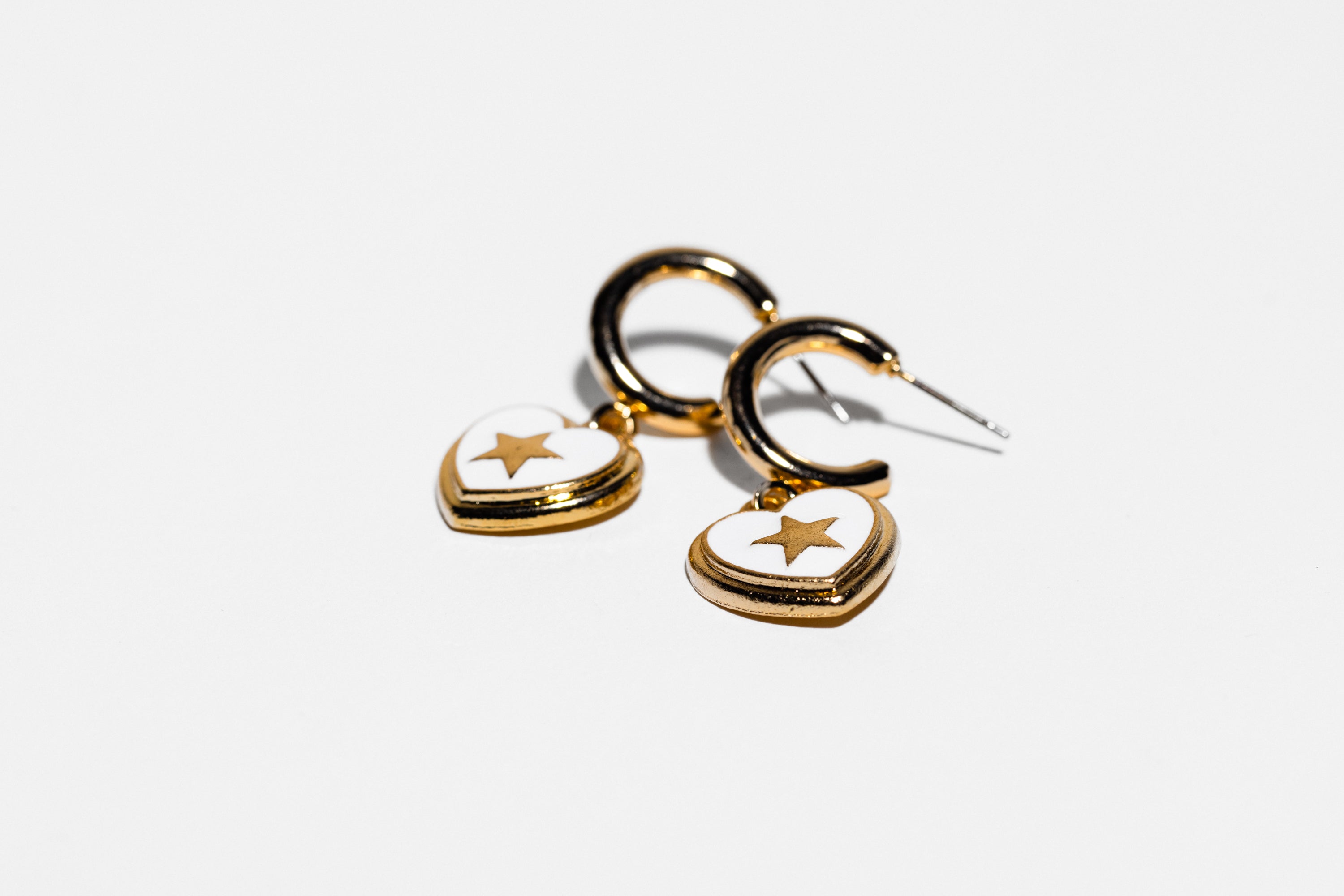 Heart Huggie With Star Detail Earring - Charming Charlie