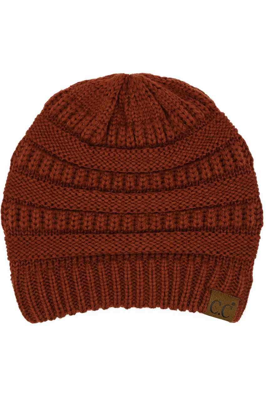 ChestnutRed C.C Ribbed Knit Solid Color Beanie offers a timeless design with durable ribbed knitting, ensuring a snug and comfortable fit. Crafted for warmth and versatility, this beanie is perfect for everyday wear, providing reliable protection against cold weather while maintaining a sleek, minimalist style that complements any outfit. Its solid color adds understated appeal, making it an essential accessory for both casual and outdoor use.