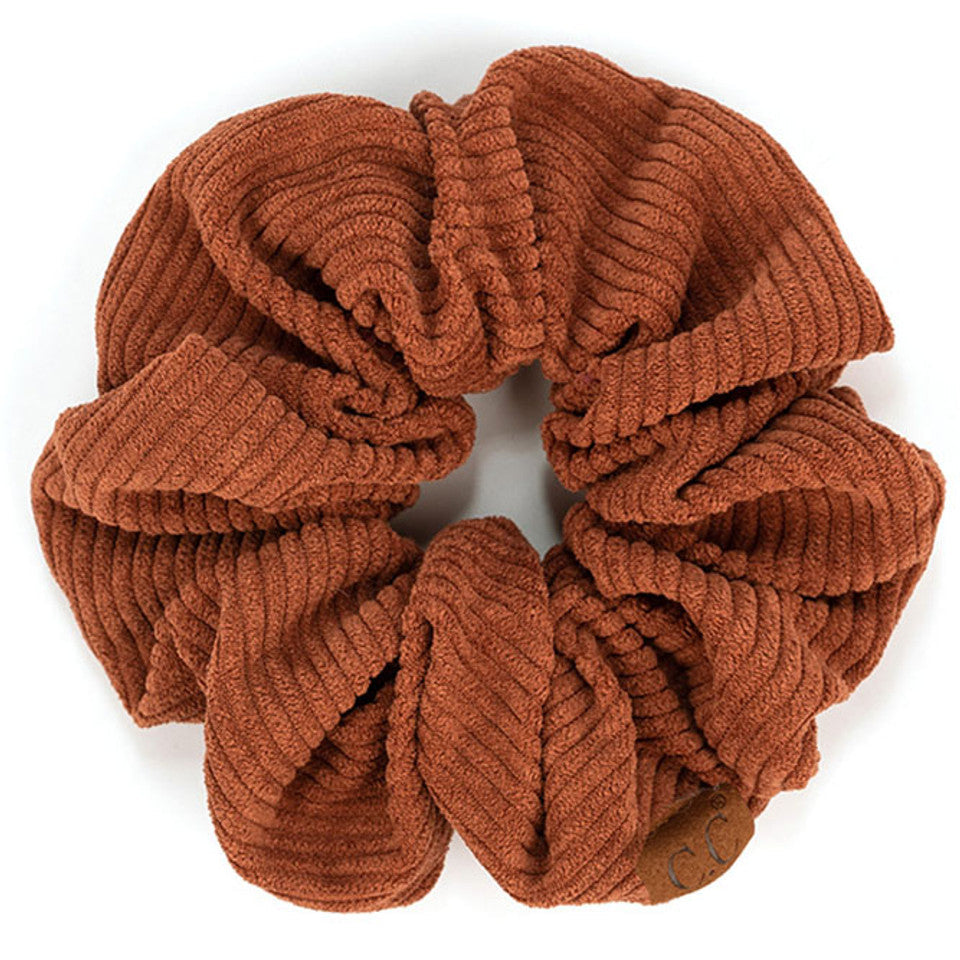 Clay C.C Corduroy Solid Color Soft Scrunchies are a must-have for any hair accessory collection. Made from soft and durable corduroy material, these scrunchies are perfect for any hair type and can hold hair in place comfortably without causing any damage. Add some style to your hairstyle with these versatile and fashionable scrunchies.