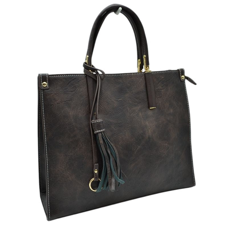 Coffee Large Shoulder Vegan Leather Tassel Handbag For Women. High quality Vegan Leather is a luxurious and durable, Stay organized in style with this square-shaped shopper tote bag that is fully two contrasting interior and exterior solid colors. This vegan leather handbag includes an on-trend removable tassel embellishment. Guaranteed, This will be your go-to handbag.