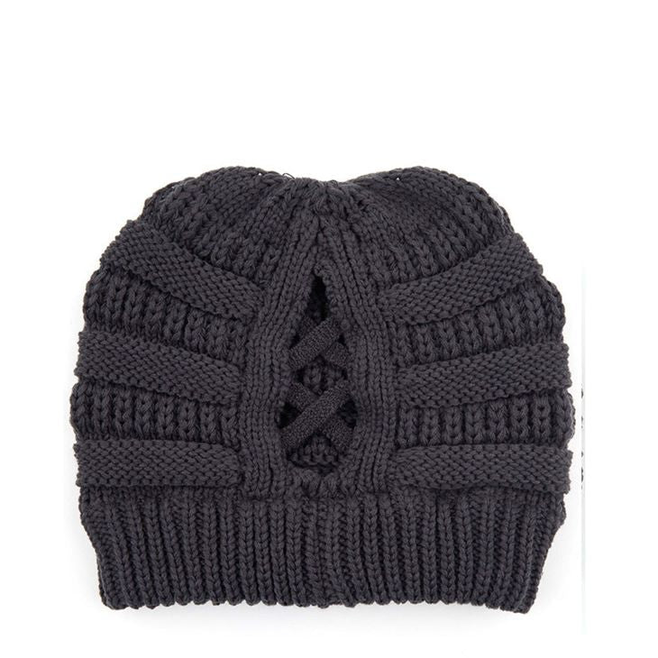 Dark Melange Grey Criss-Cross Knit C.C Beanie blends stylish design with practical warmth. Crafted with a unique criss-cross knit pattern, it provides enhanced insulation and a comfortable fit. Ideal for cold weather, this beanie offers both functionality and a sophisticated look for everyday wear. Durable and easy to care for, it’s an excellent accessory for layering during chilly seasons.
