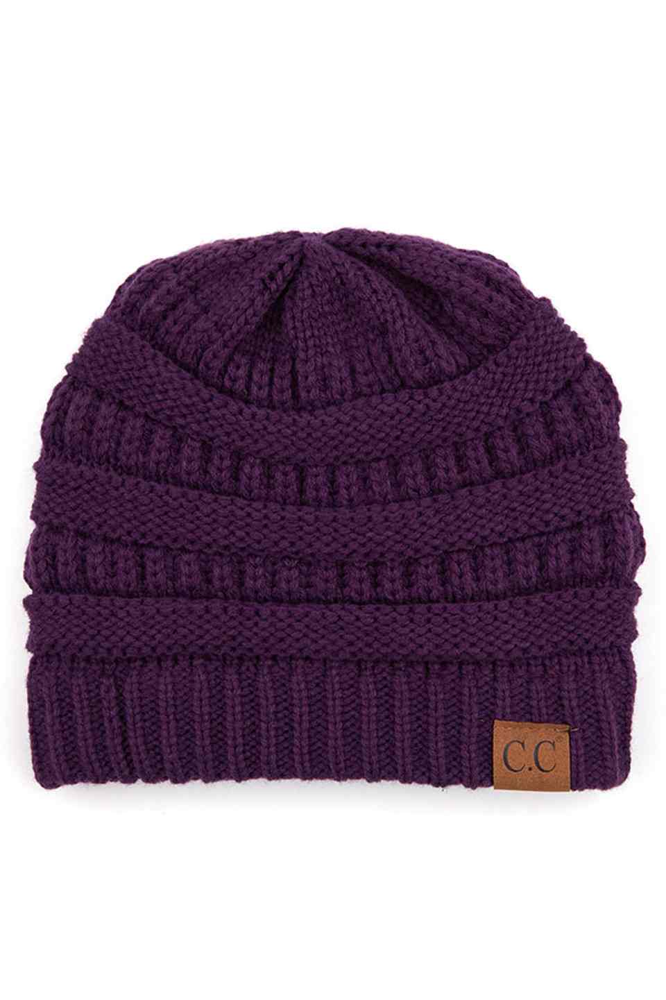 DarkPurple C.C Ribbed Knit Solid Color Beanie offers a timeless design with durable ribbed knitting, ensuring a snug and comfortable fit. Crafted for warmth and versatility, this beanie is perfect for everyday wear, providing reliable protection against cold weather while maintaining a sleek, minimalist style that complements any outfit. Its solid color adds understated appeal, making it an essential accessory for both casual and outdoor use.