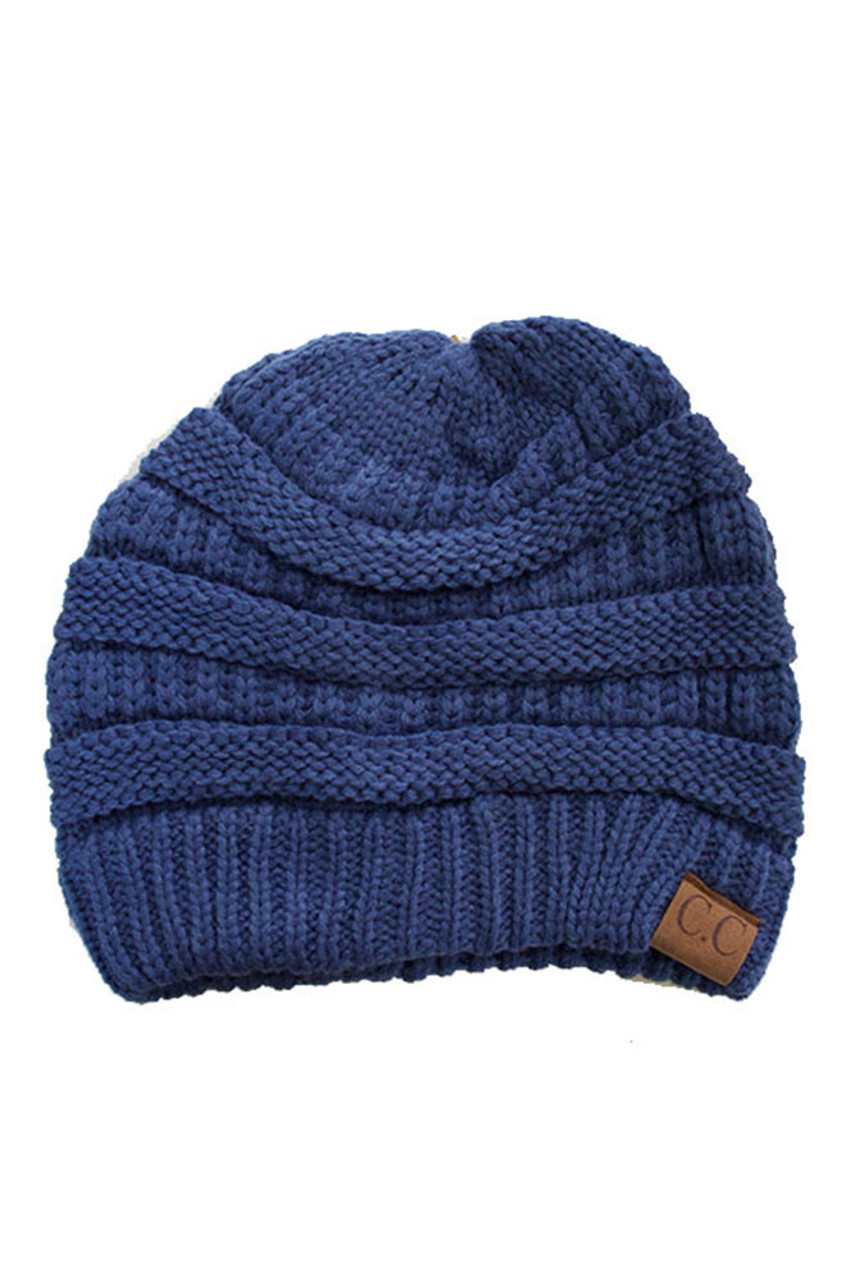 Denim C.C Ribbed Knit Solid Color Beanie offers a timeless design with durable ribbed knitting, ensuring a snug and comfortable fit. Crafted for warmth and versatility, this beanie is perfect for everyday wear, providing reliable protection against cold weather while maintaining a sleek, minimalist style that complements any outfit. Its solid color adds understated appeal, making it an essential accessory for both casual and outdoor use.