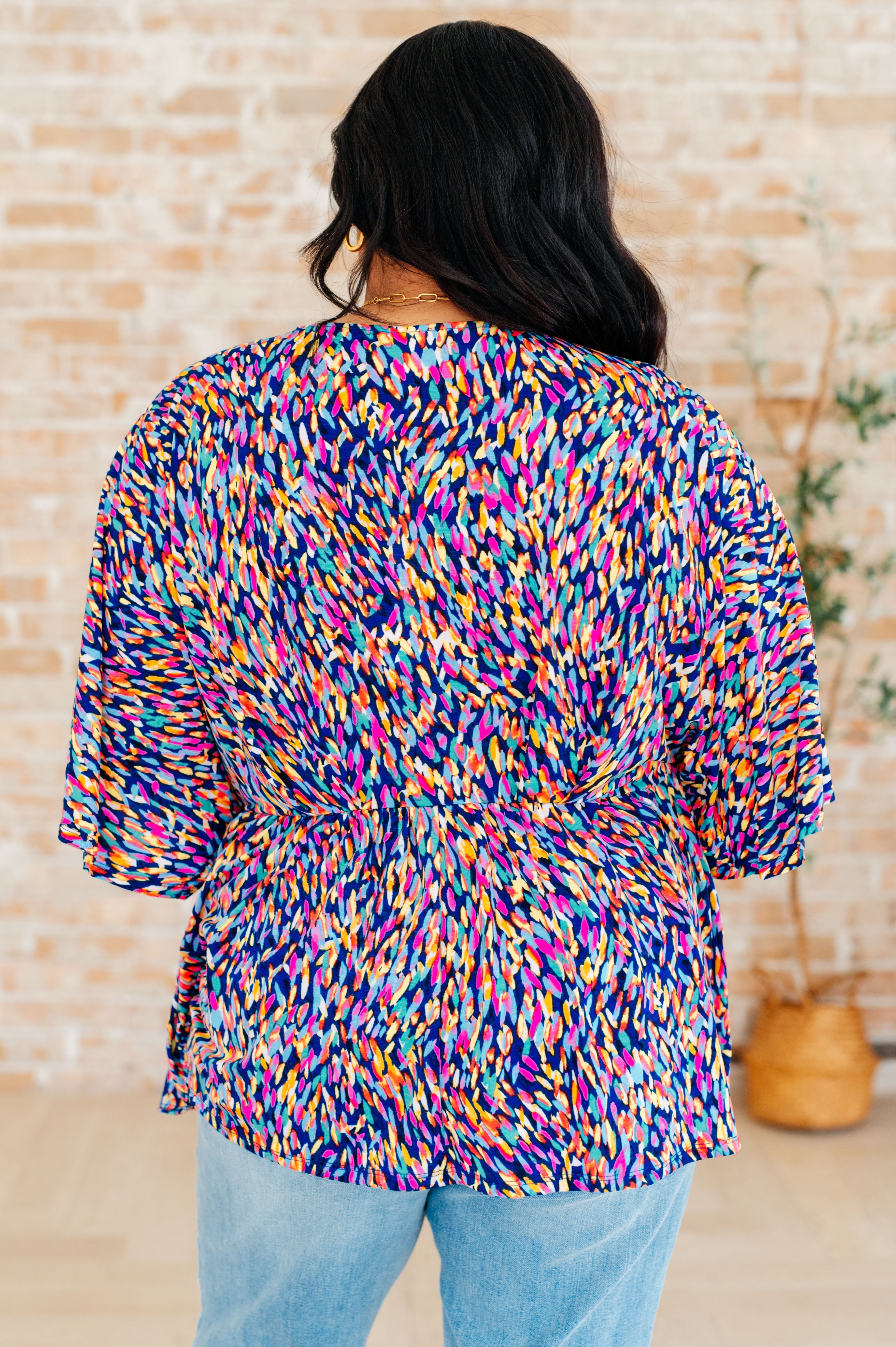 Dreamer Peplum Top in Painted Royal Multi - Charming Charlie