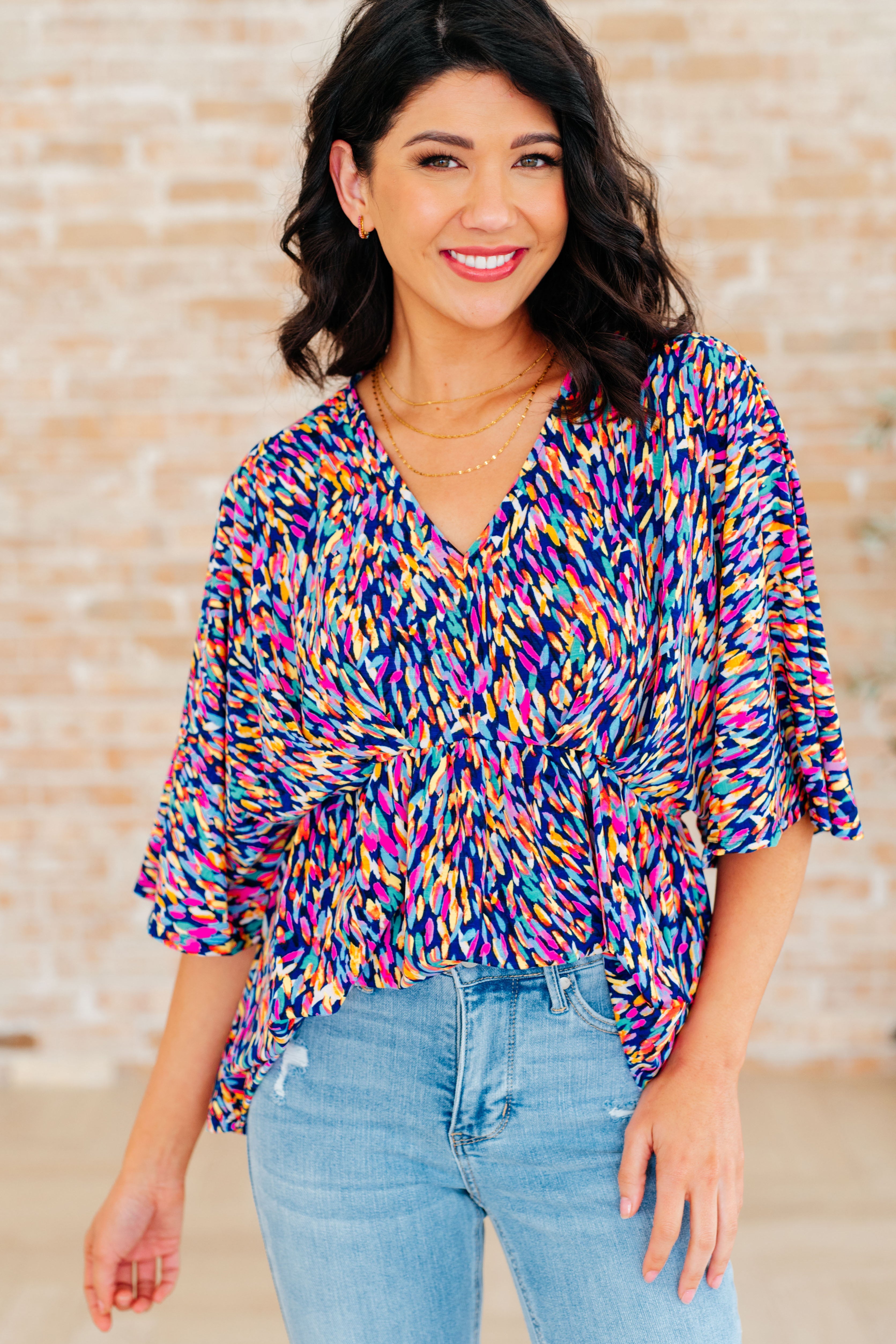 Dreamer Peplum Top in Painted Royal Multi - Charming Charlie