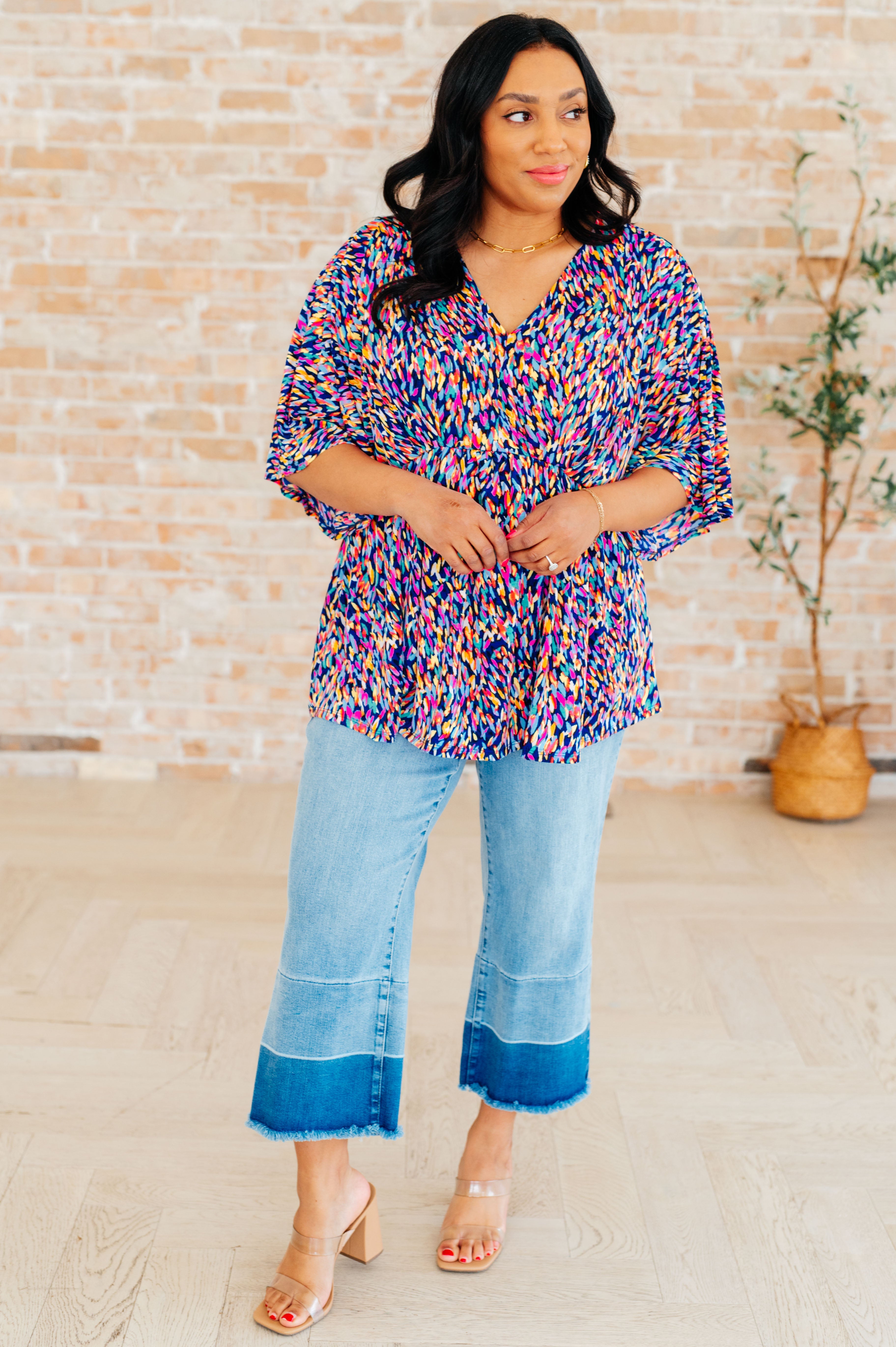 Dreamer Peplum Top in Painted Royal Multi - Charming Charlie