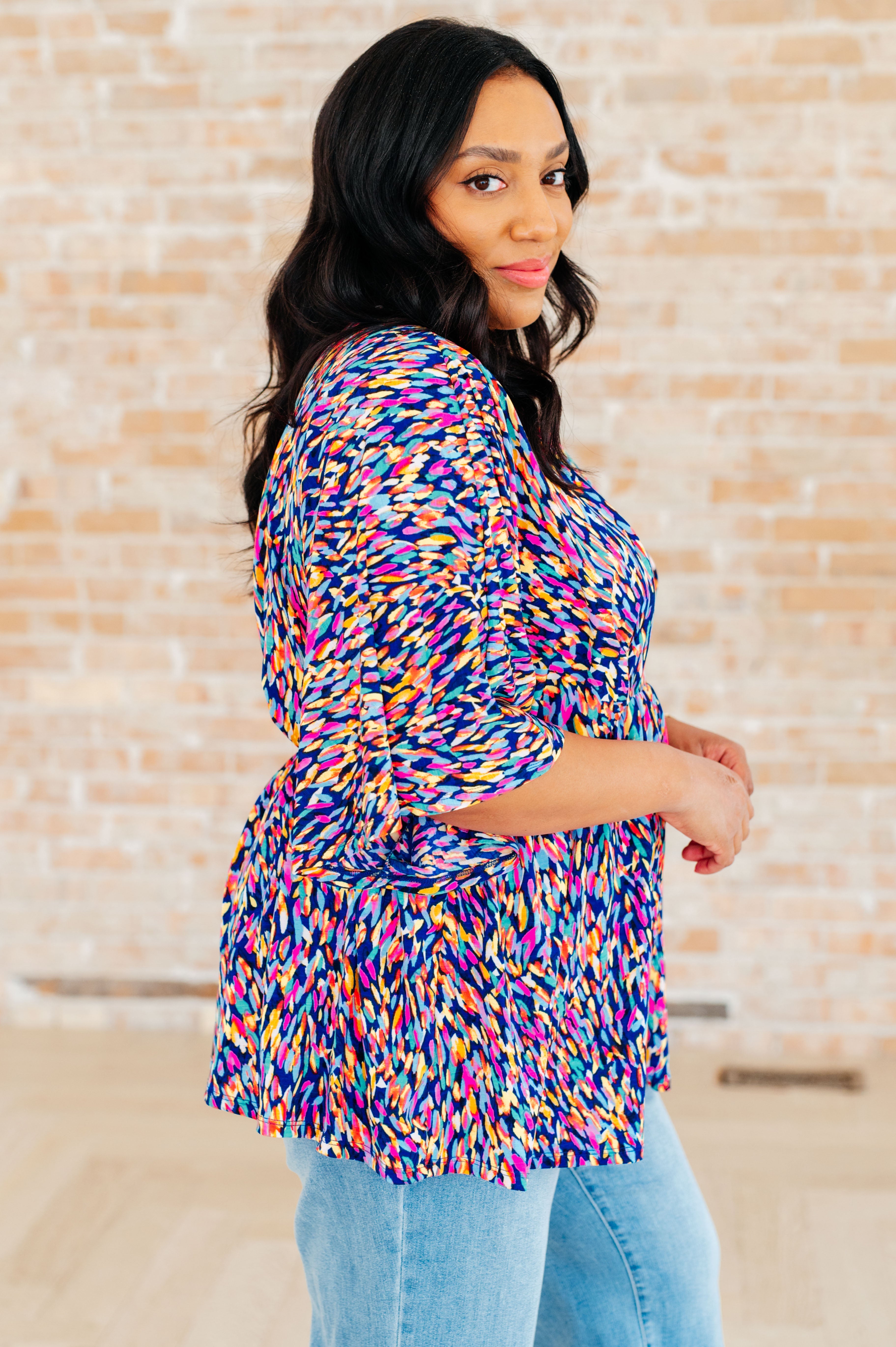 Dreamer Peplum Top in Painted Royal Multi - Charming Charlie