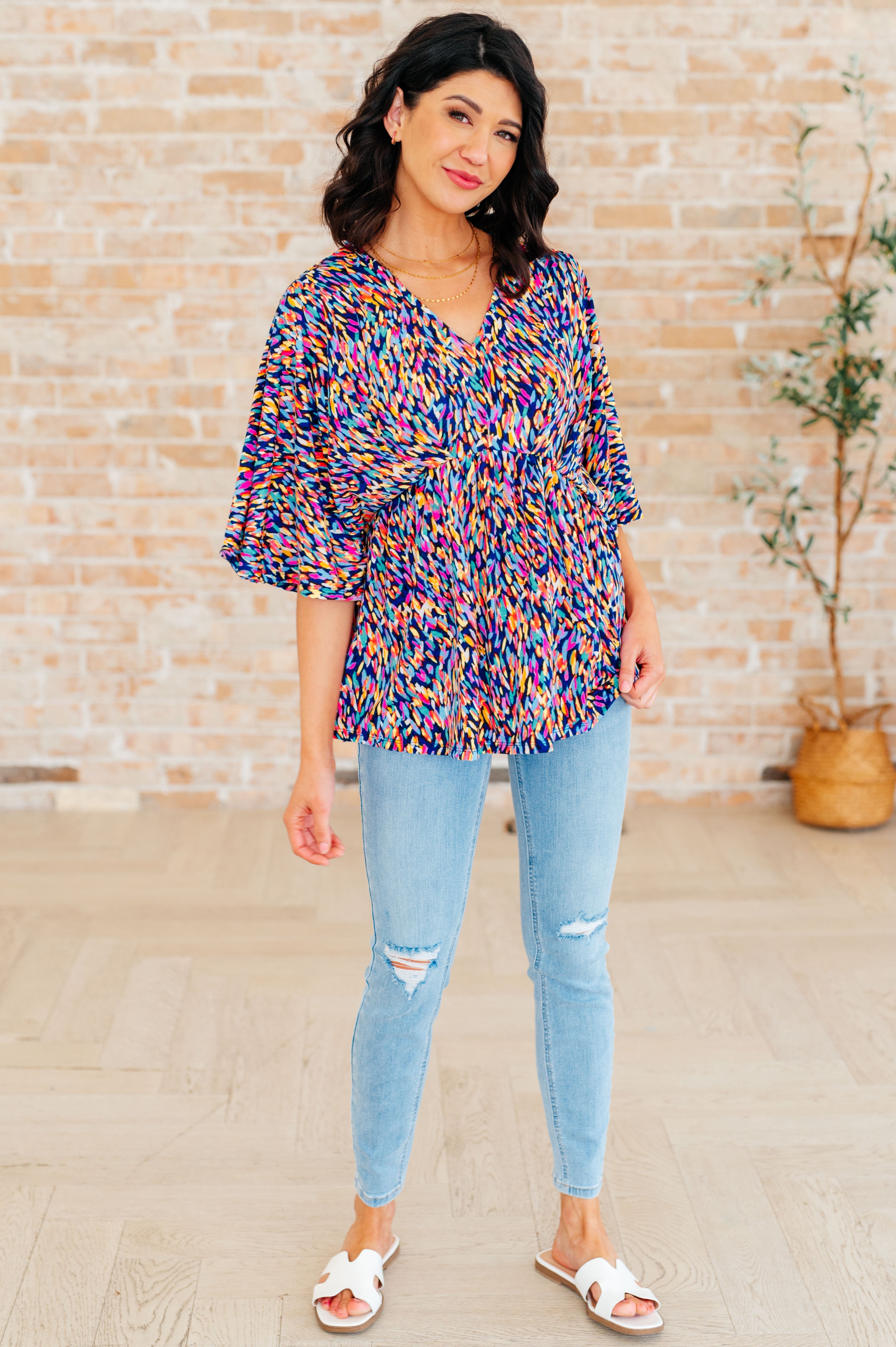 Dreamer Peplum Top in Painted Royal Multi - Charming Charlie