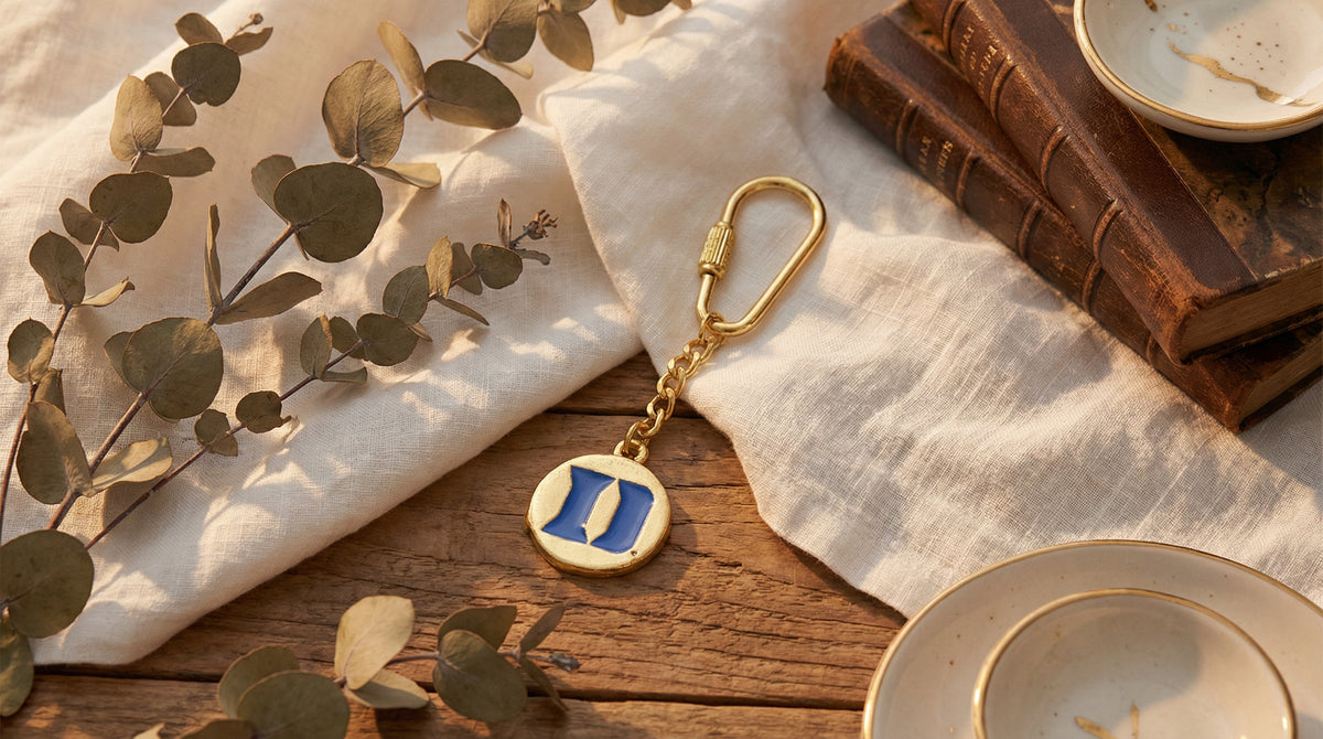 Small Gold Duke Blue Devils Logo Keychain - Charming Charlie